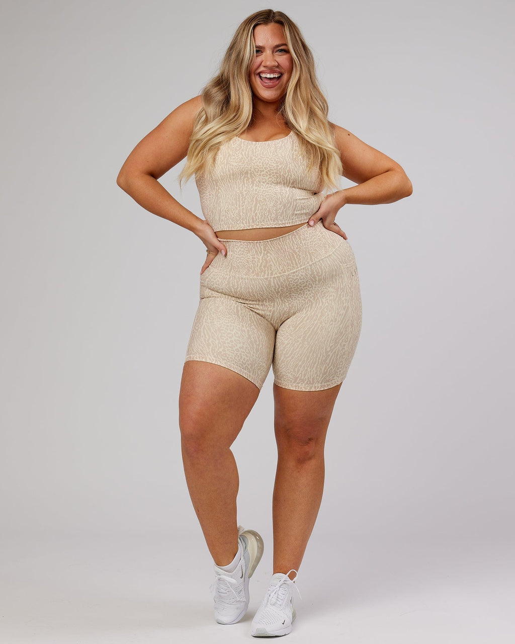 Model wearing Determined Shelf Sports Tank - Rise Print