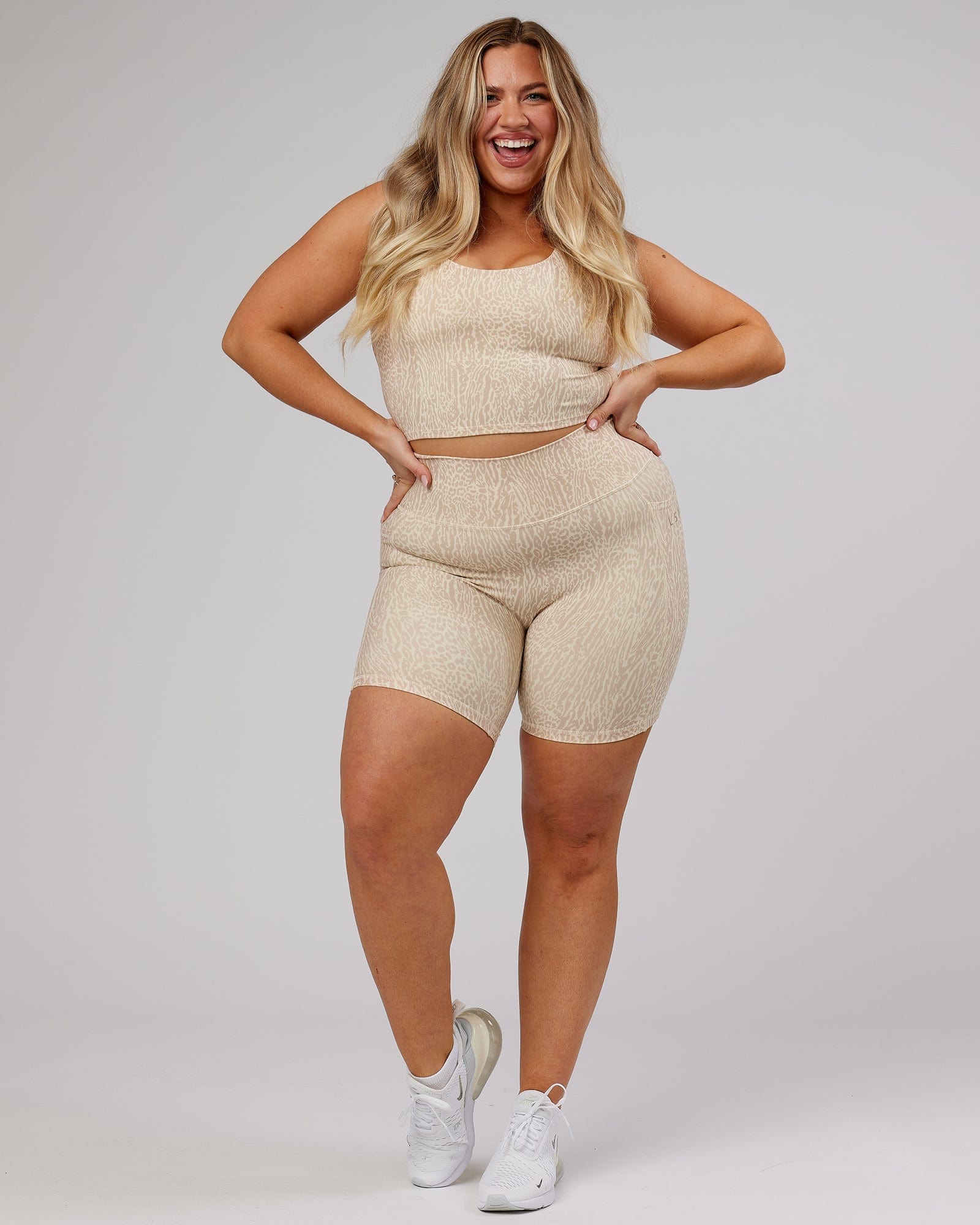 Model wearing Determined Shelf Sports Tank - Rise Print