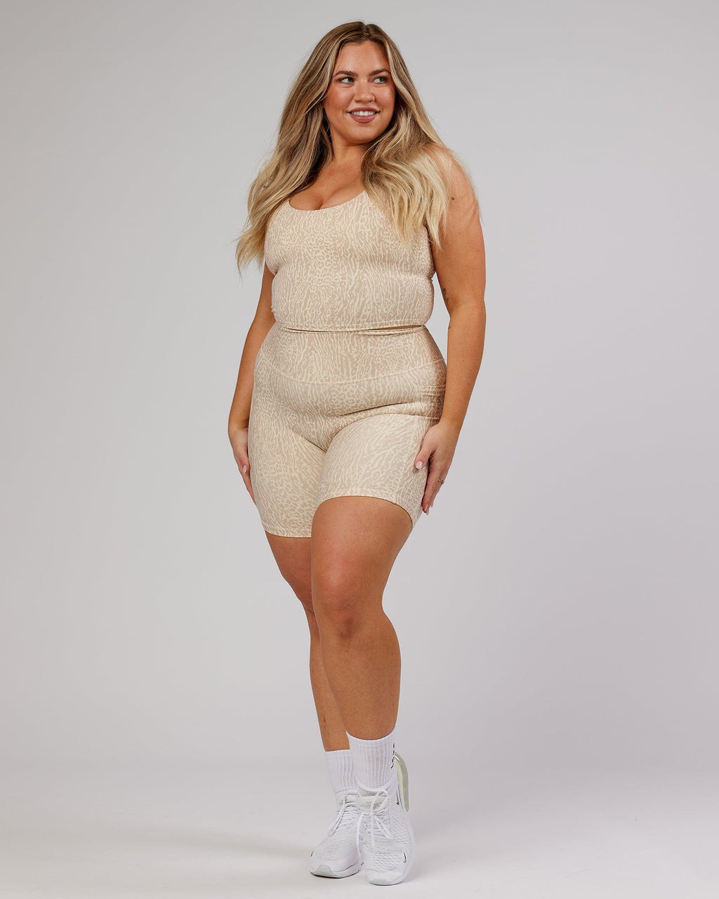 Model wearing Determined Shelf Sports Tank - Rise Print