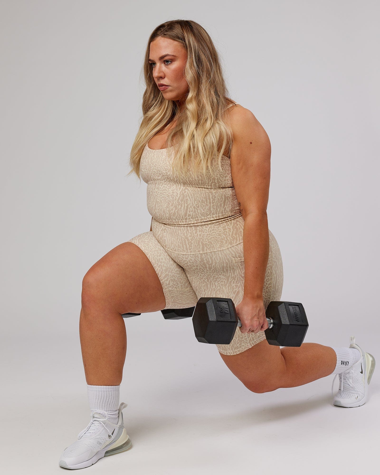 Model wearing Determined Shelf Sports Tank - Rise Print