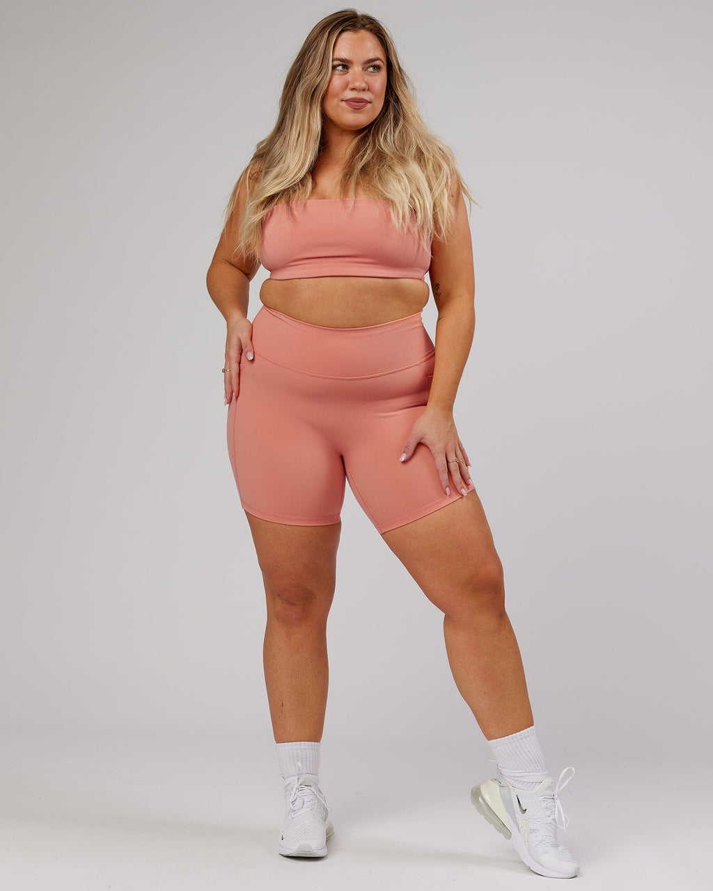 Model wearing Energise Bandeau - Peach