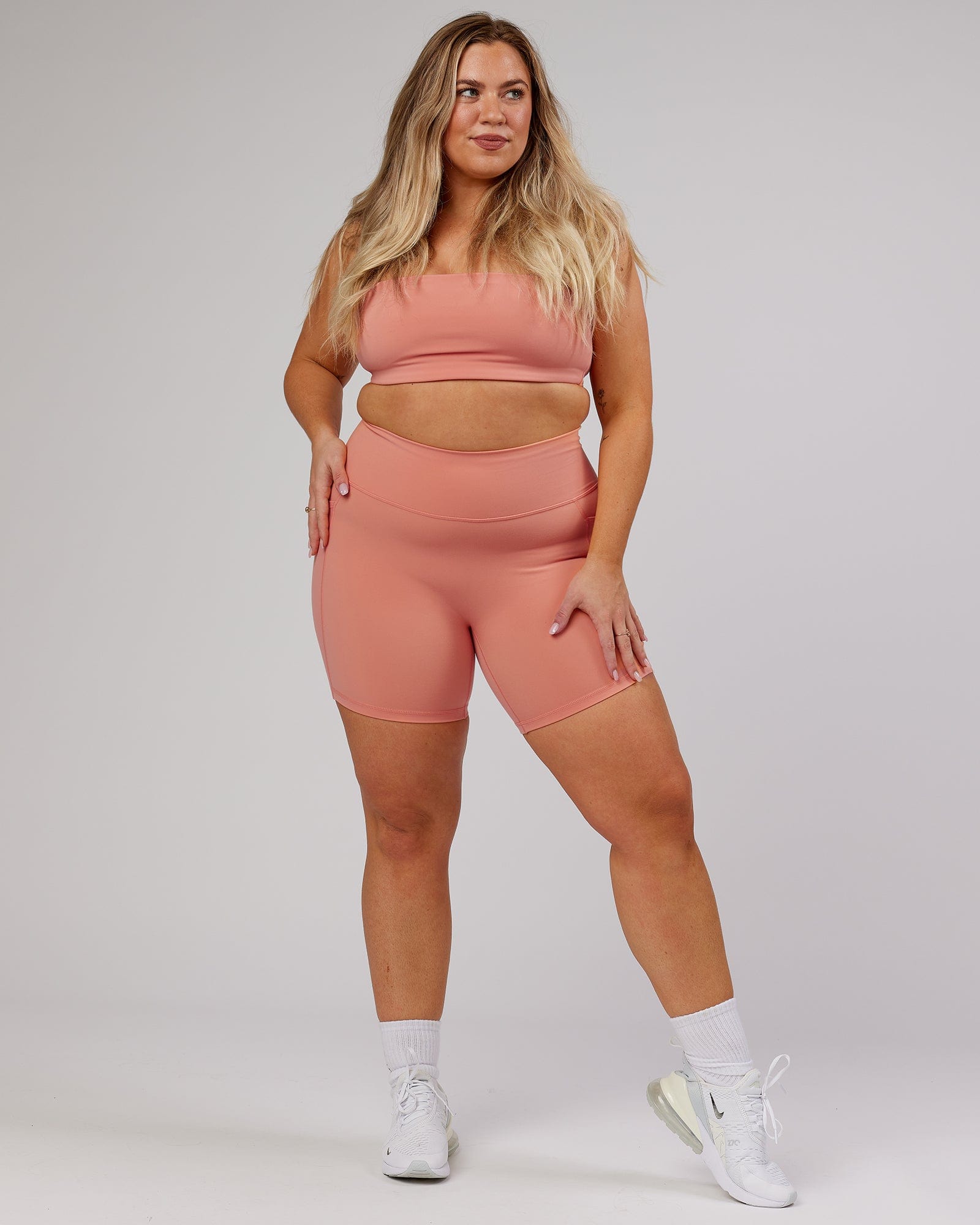 Model wearing Energise Bandeau - Peach