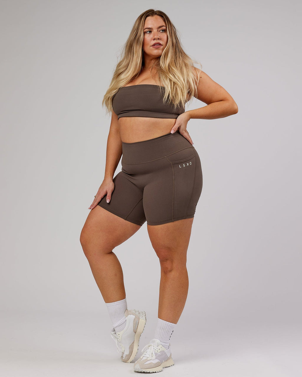 Model wearing Energise Mid Short Tight - Mocha