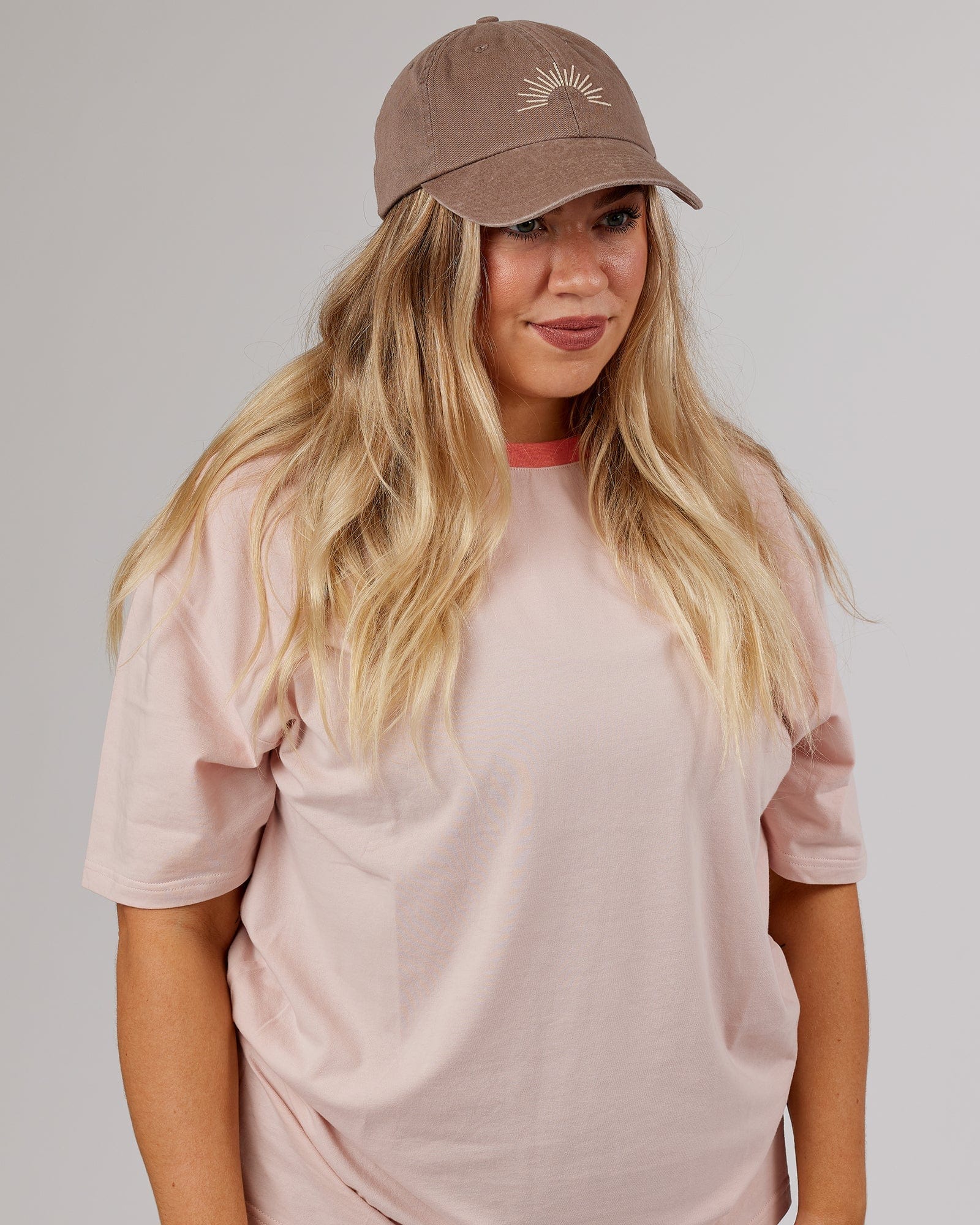 Model wearing Rise Cap - Warm Taupe