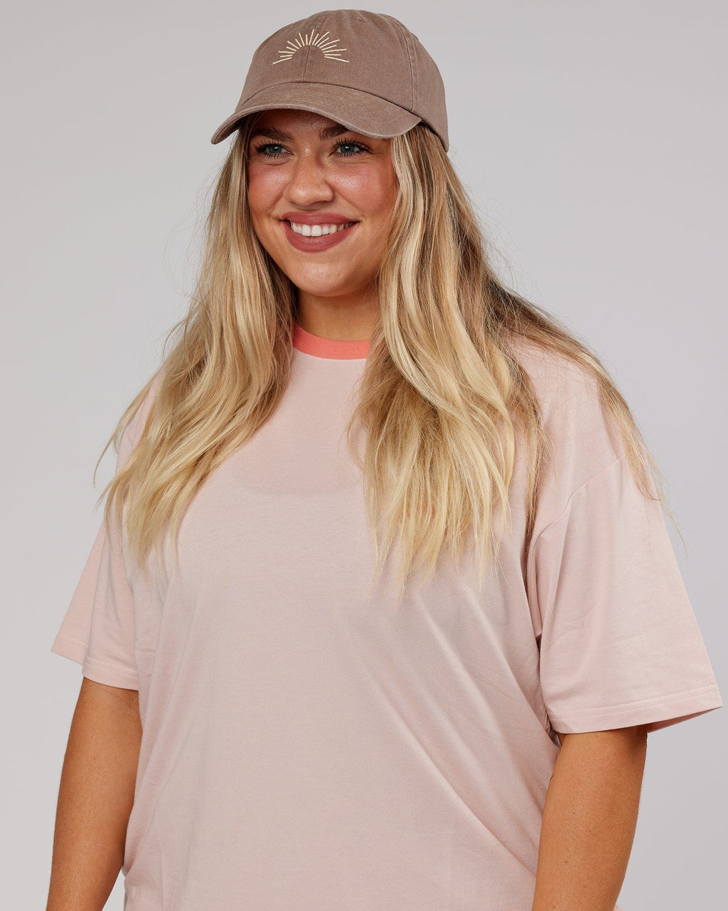 Model wearing Rise Cap - Warm Taupe