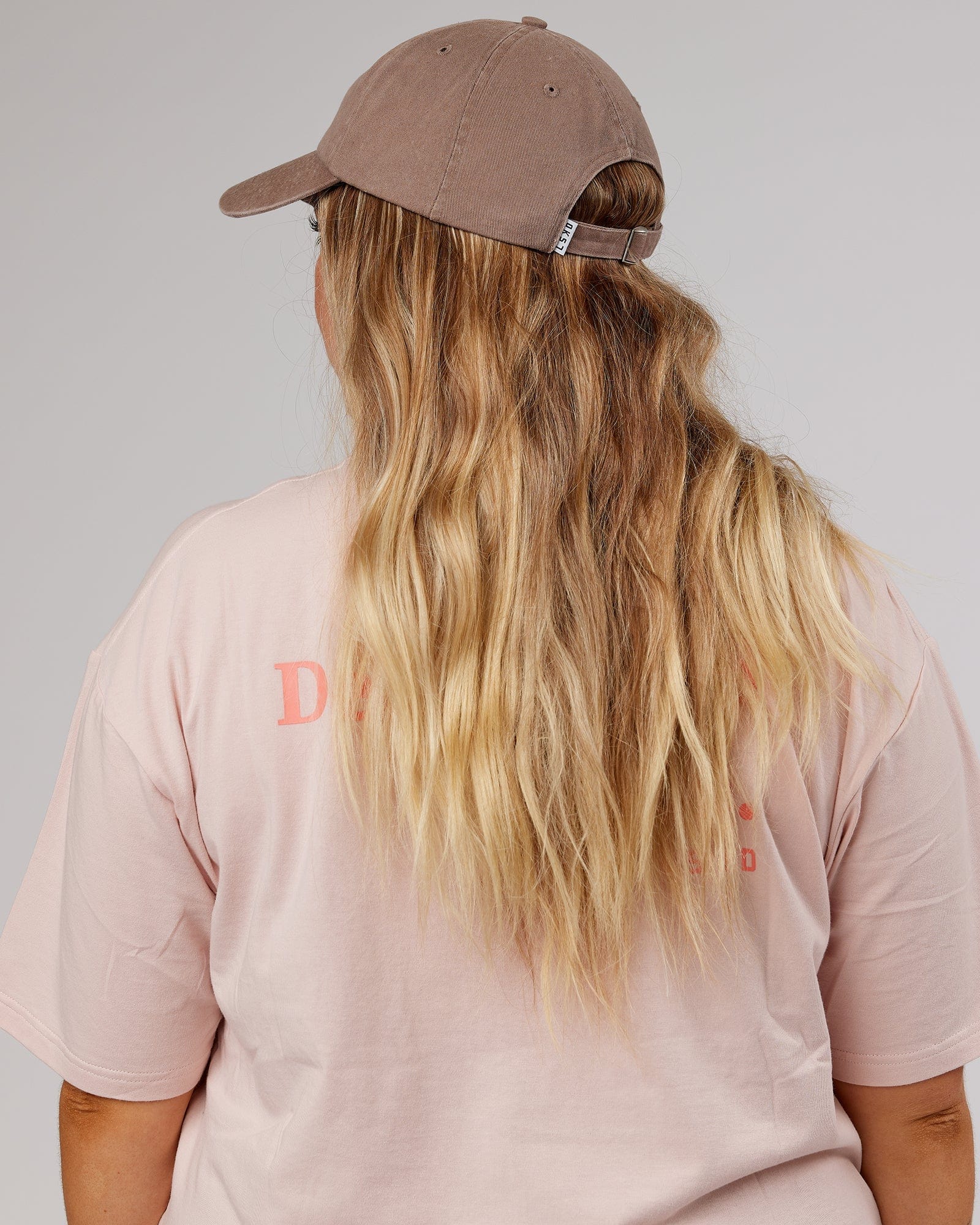 Model wearing Rise Cap - Warm Taupe