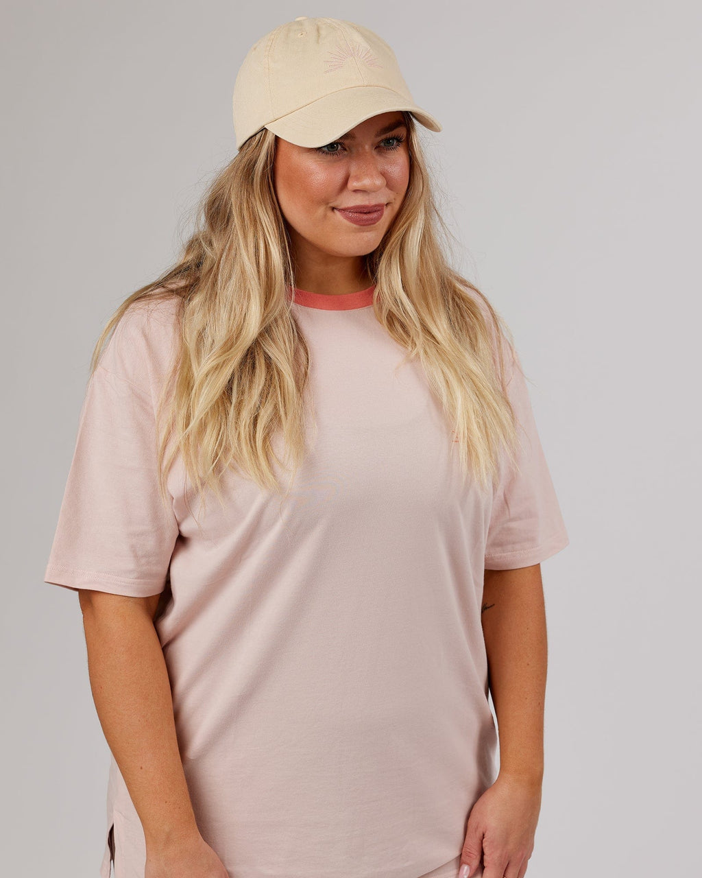 Model wearing Rise Cap - Classic Cream