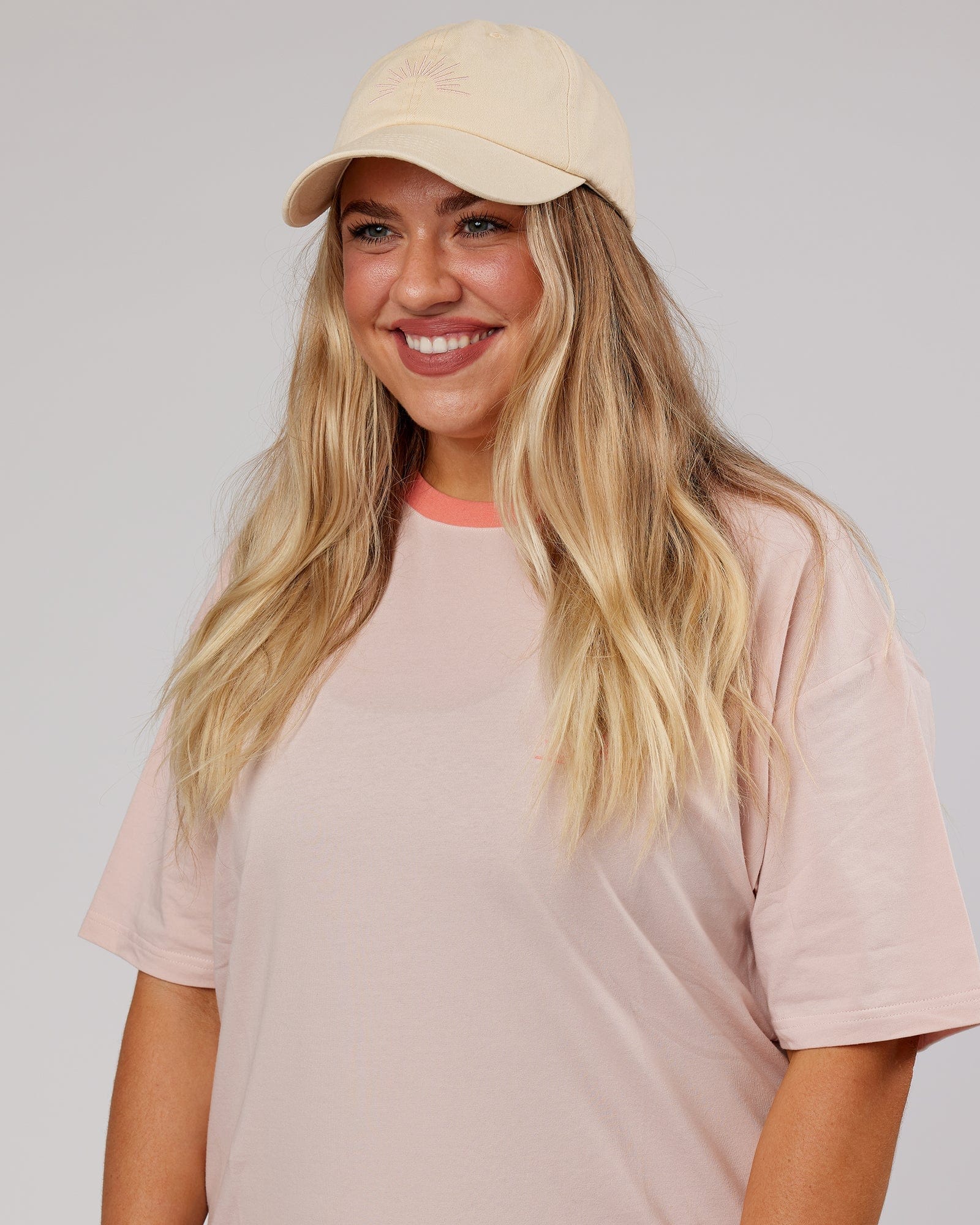 Model wearing Rise Cap - Classic Cream