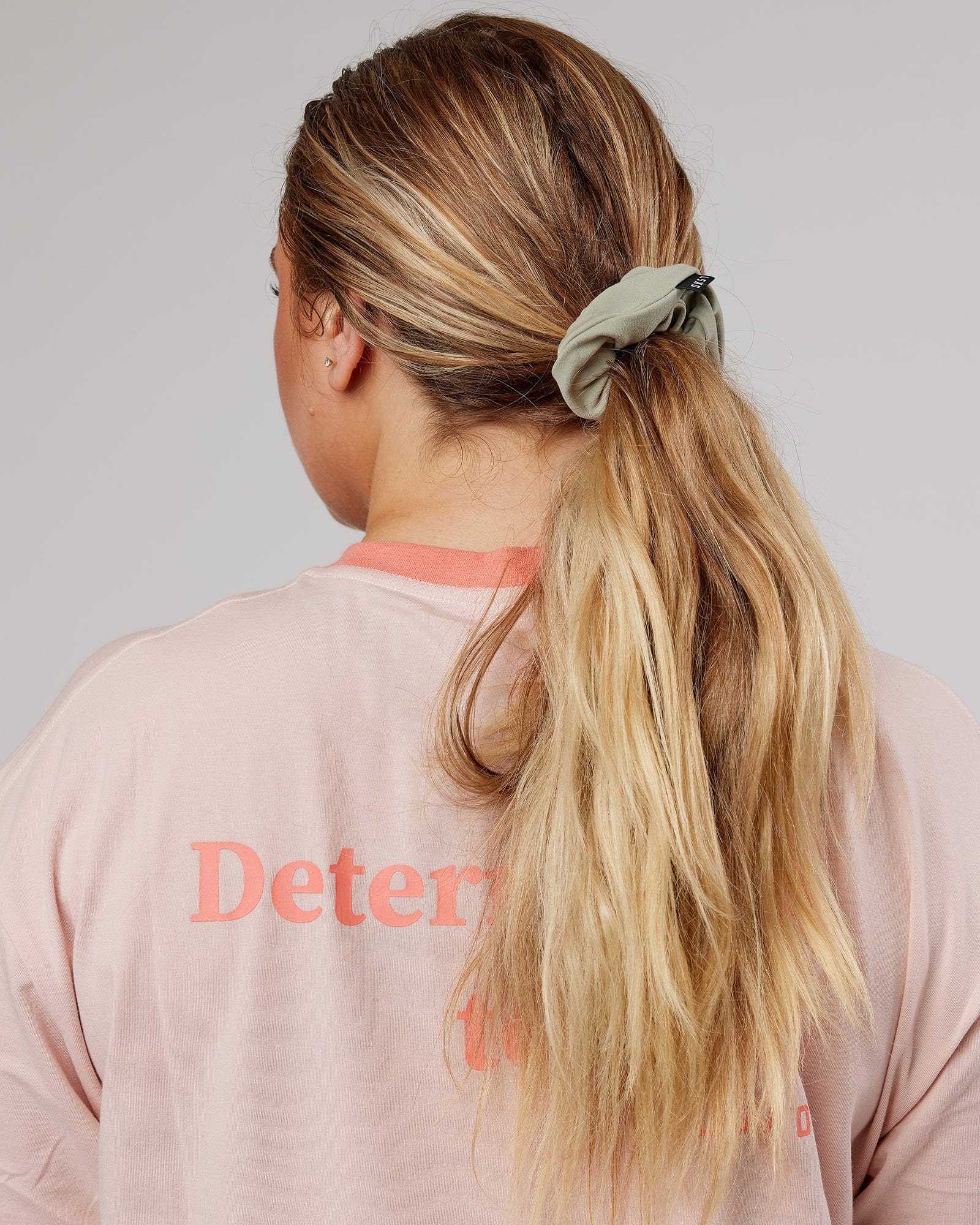 Model wearing Elevate Scrunchie - Sage