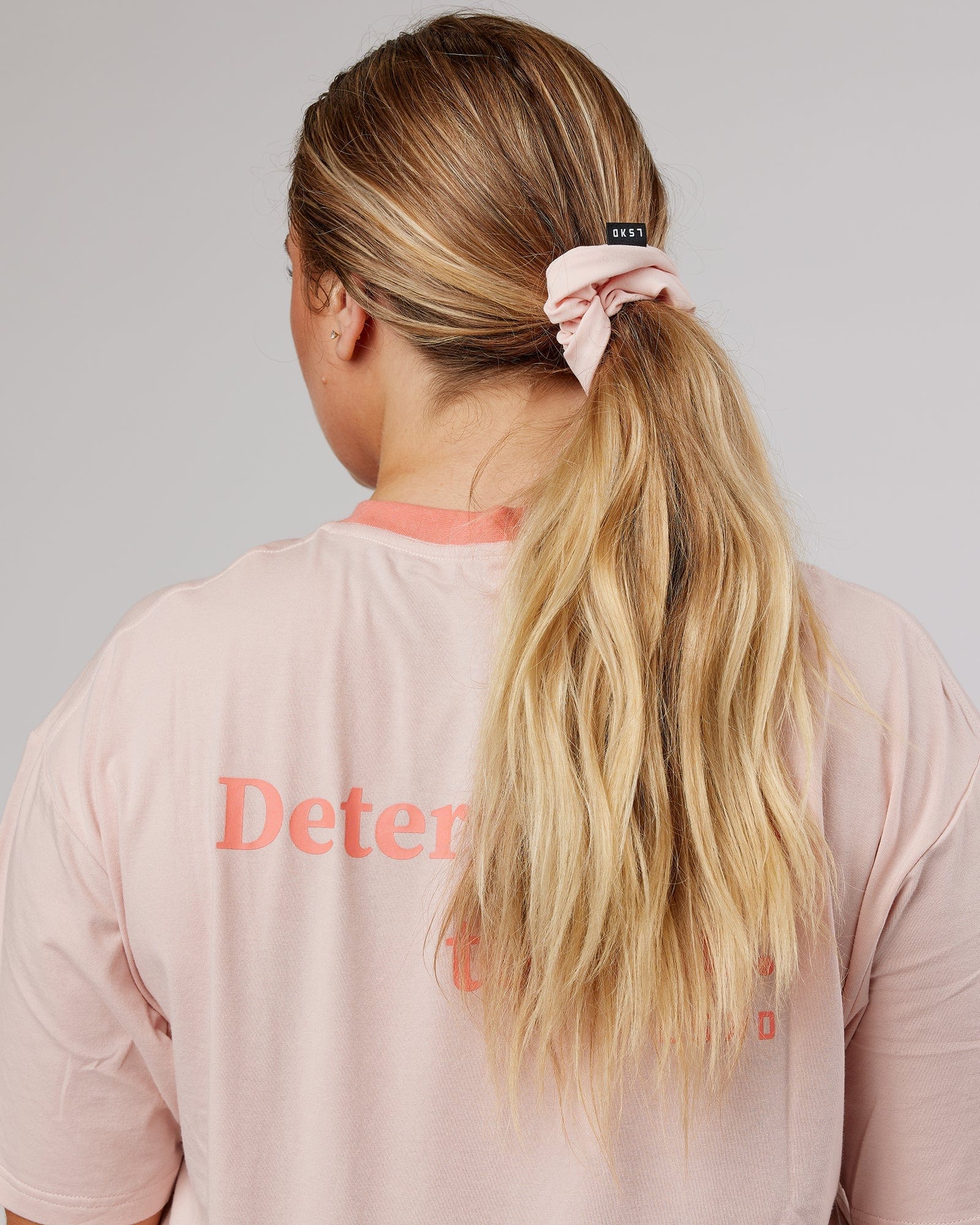 Model wearing Elevate Scrunchie - Peach Flush