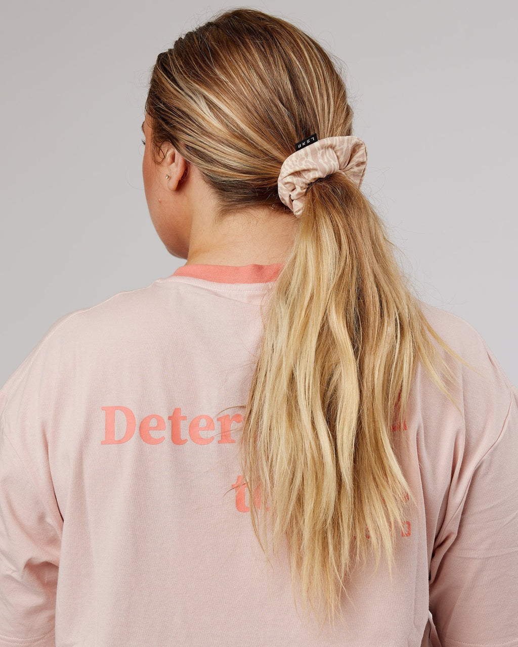 Model wearing Elevate Scrunchie - Rise Print