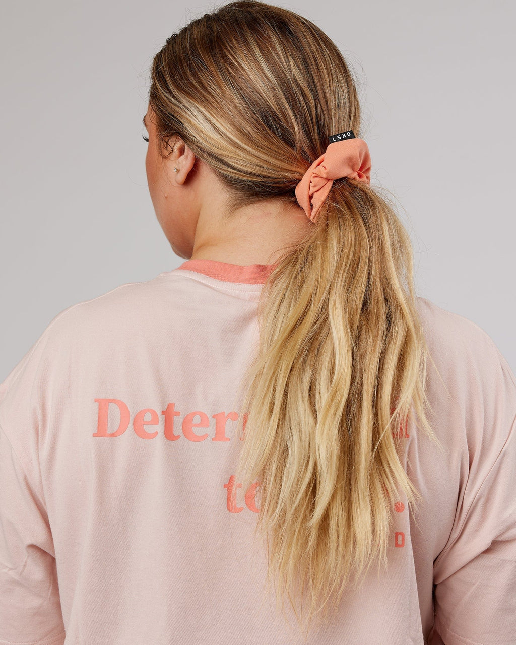 Model wearing Elevate Scrunchie - Peach