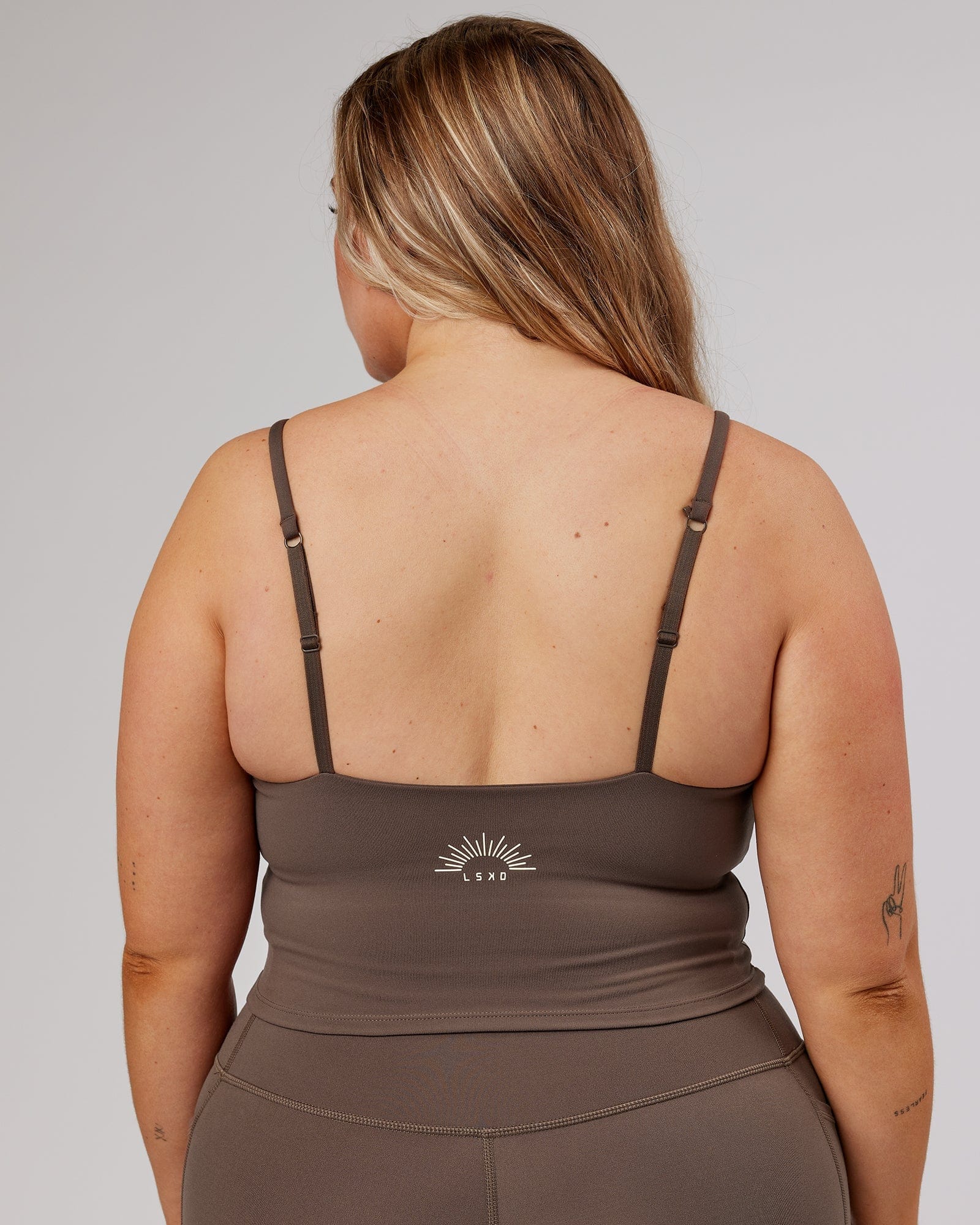 Model wearing Determined Shelf Sports Tank - Mocha