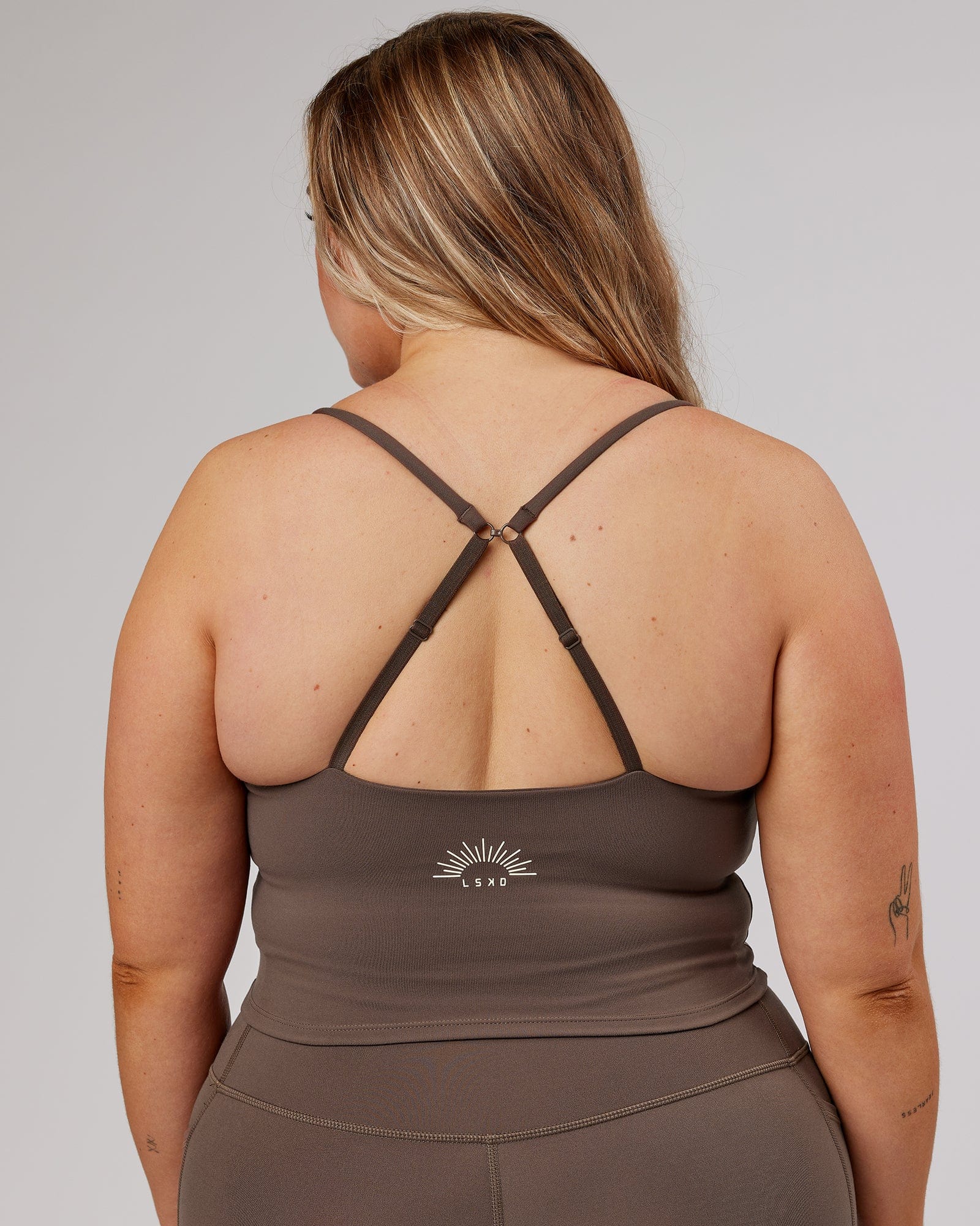 Model wearing Determined Shelf Sports Tank - Mocha