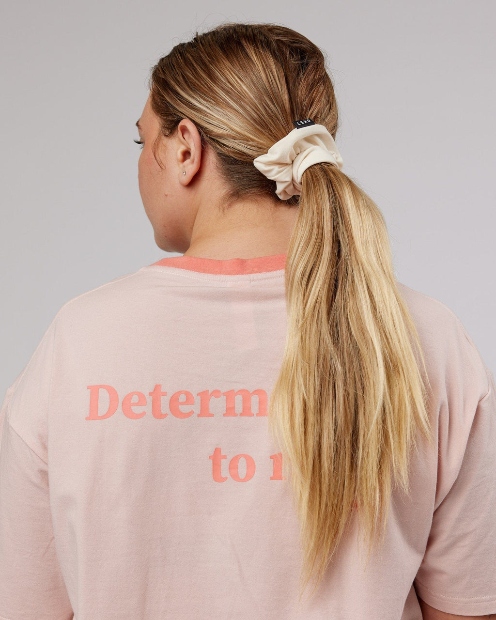 Model wearing Elevate Scrunchie - Classic Cream