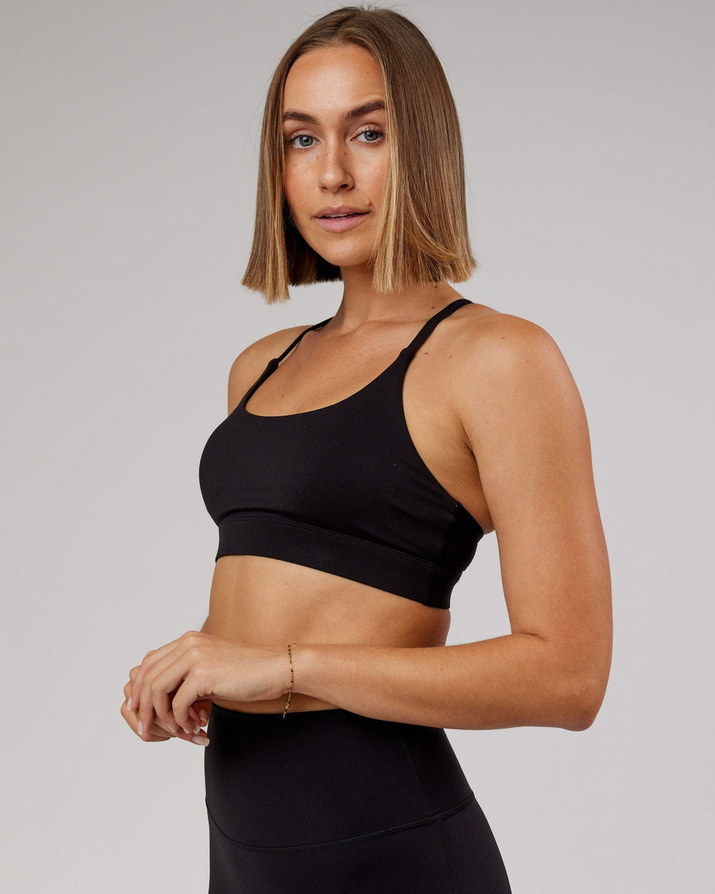 Model wearing Elixir Sports Bra - Black