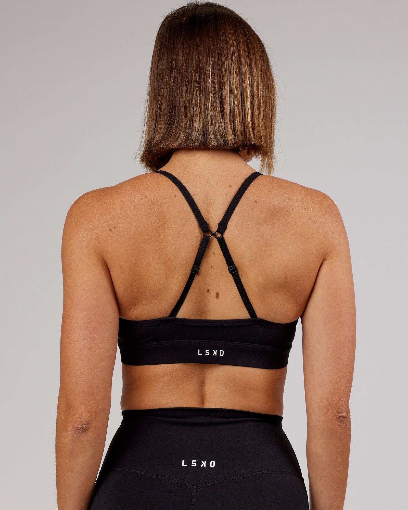 Model wearing Elixir Sports Bra - Black