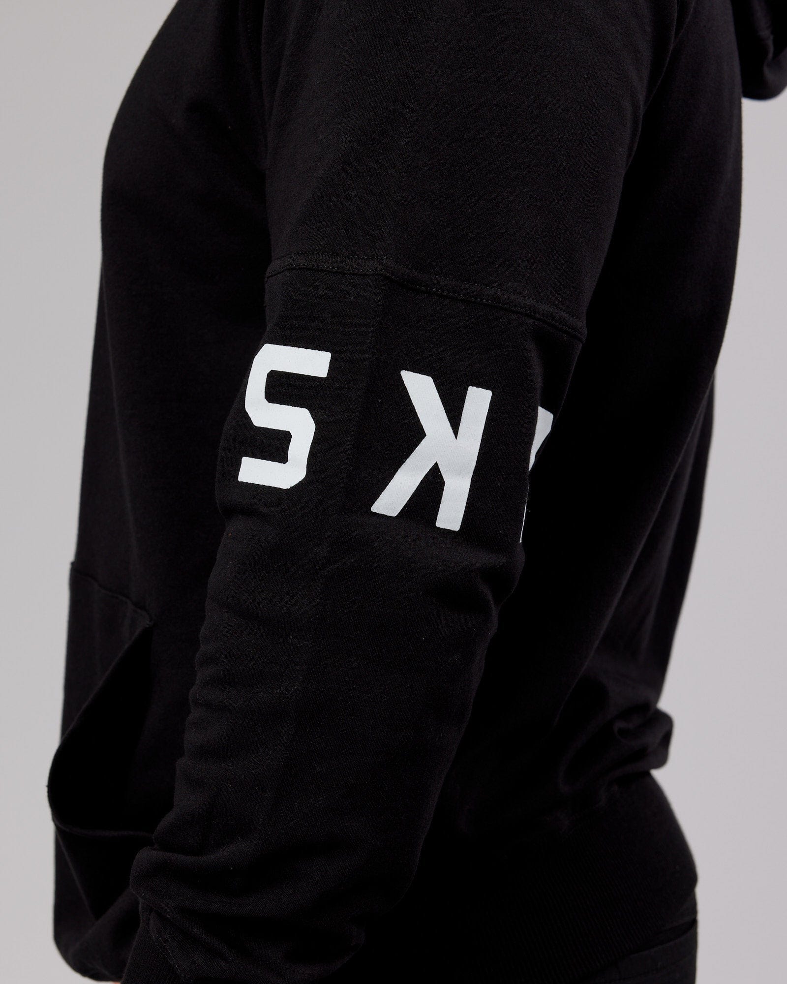 Model wearing Perimeter FLXFleece Hoodie - Black