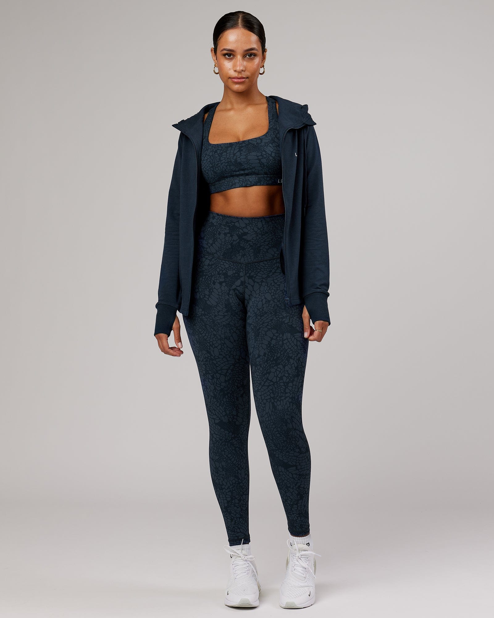 Model wearing PB Zip Through Hoodie - Carbon-Tonal