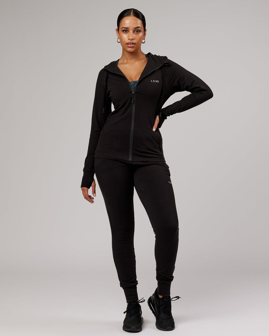 Model wearing PB Zip Through Hoodie - Black-Tonal