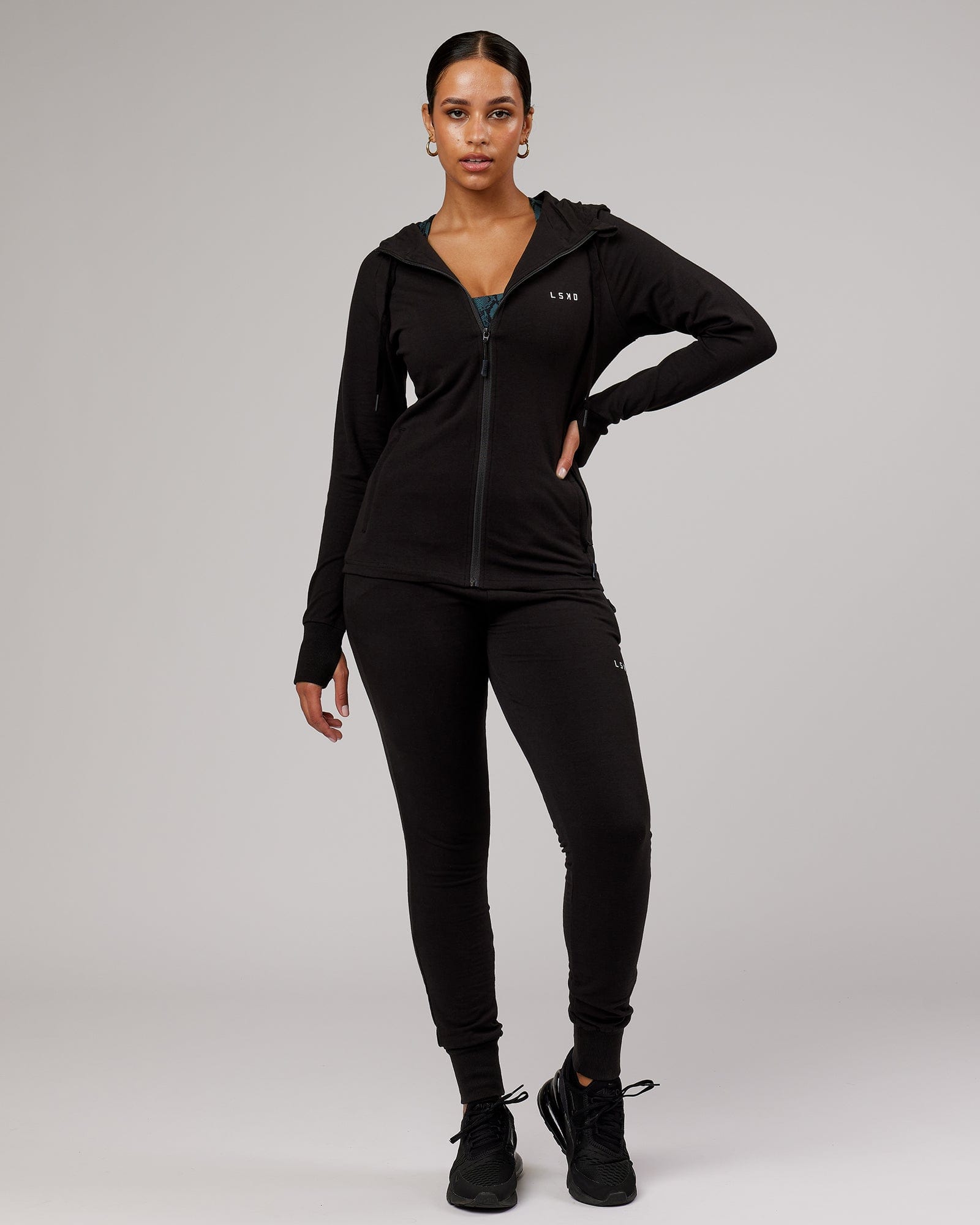 Model wearing PB Zip Through Hoodie - Black-Tonal