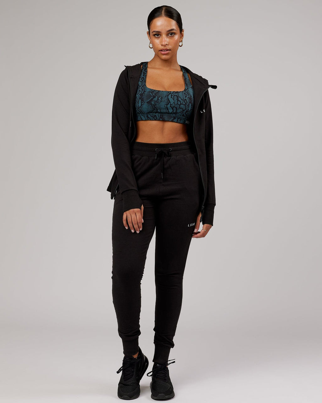 Model wearing PB Zip Through Hoodie - Black-Tonal