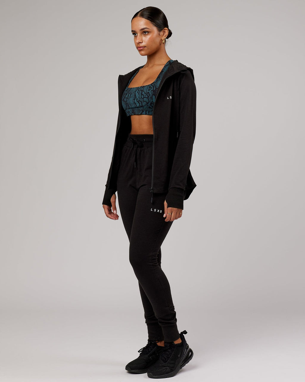 Model wearing PB Zip Through Hoodie - Black-Tonal