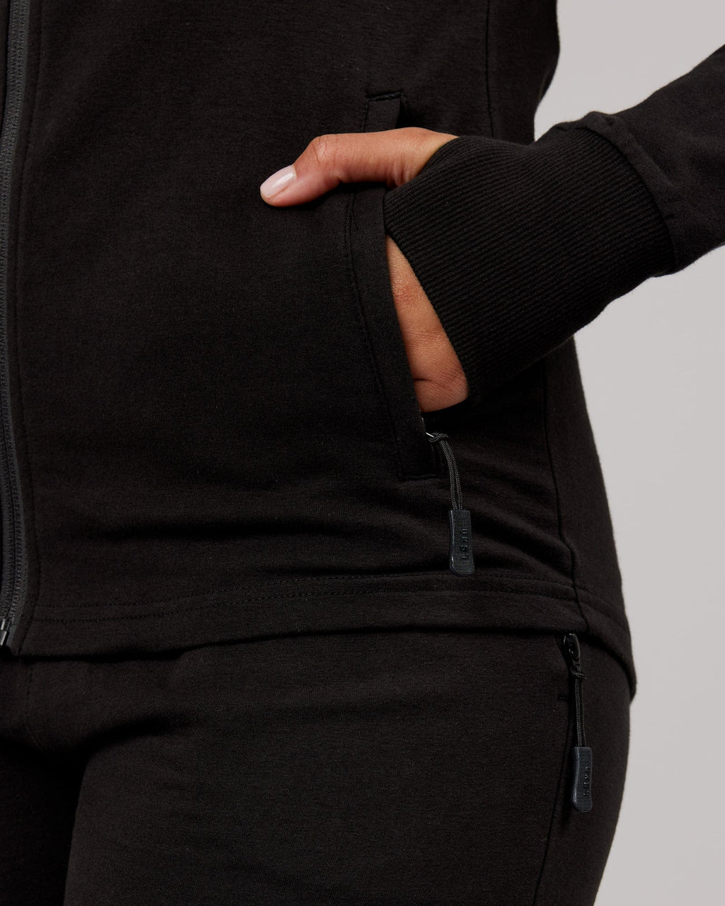 Model wearing PB Zip Through Hoodie - Black-Tonal