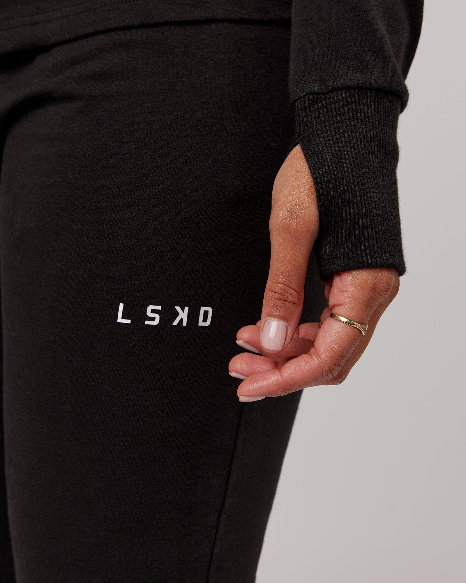 Model wearing PB Zip Through Hoodie - Black-Tonal