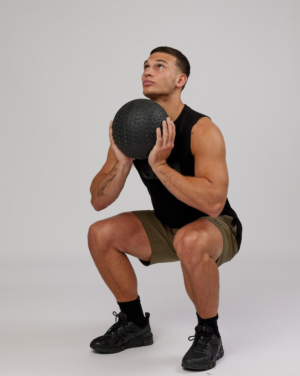Model wearing Rep 7'' Performance Short - Army Green