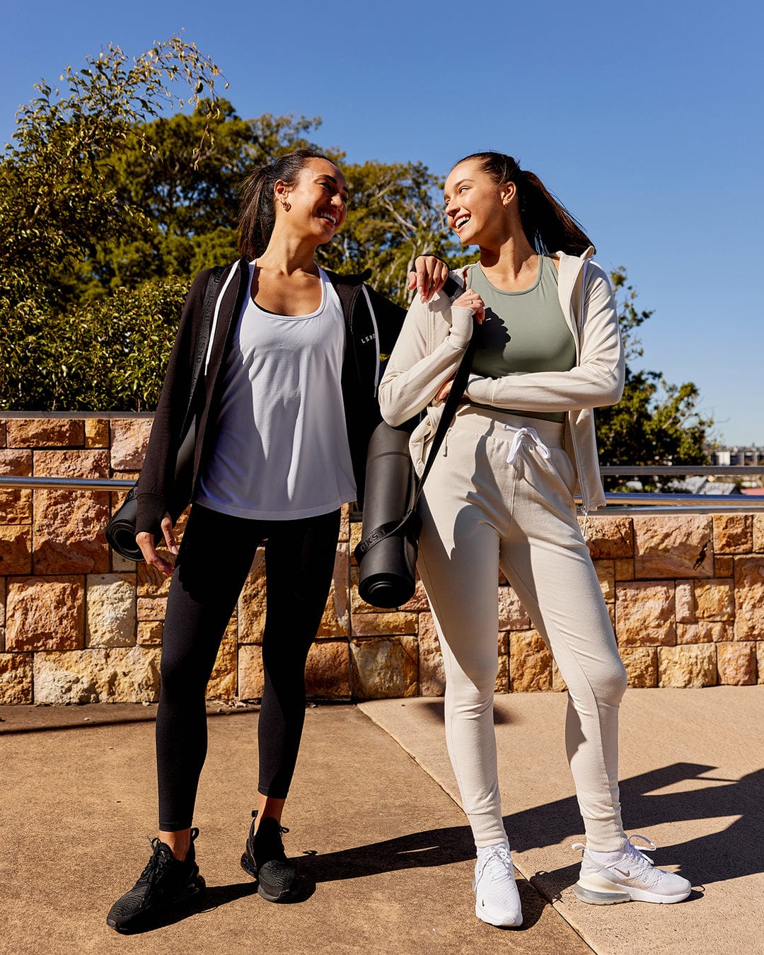 Model wearing Flow Premium Yoga Mat 55mm with Carry Strap - Black