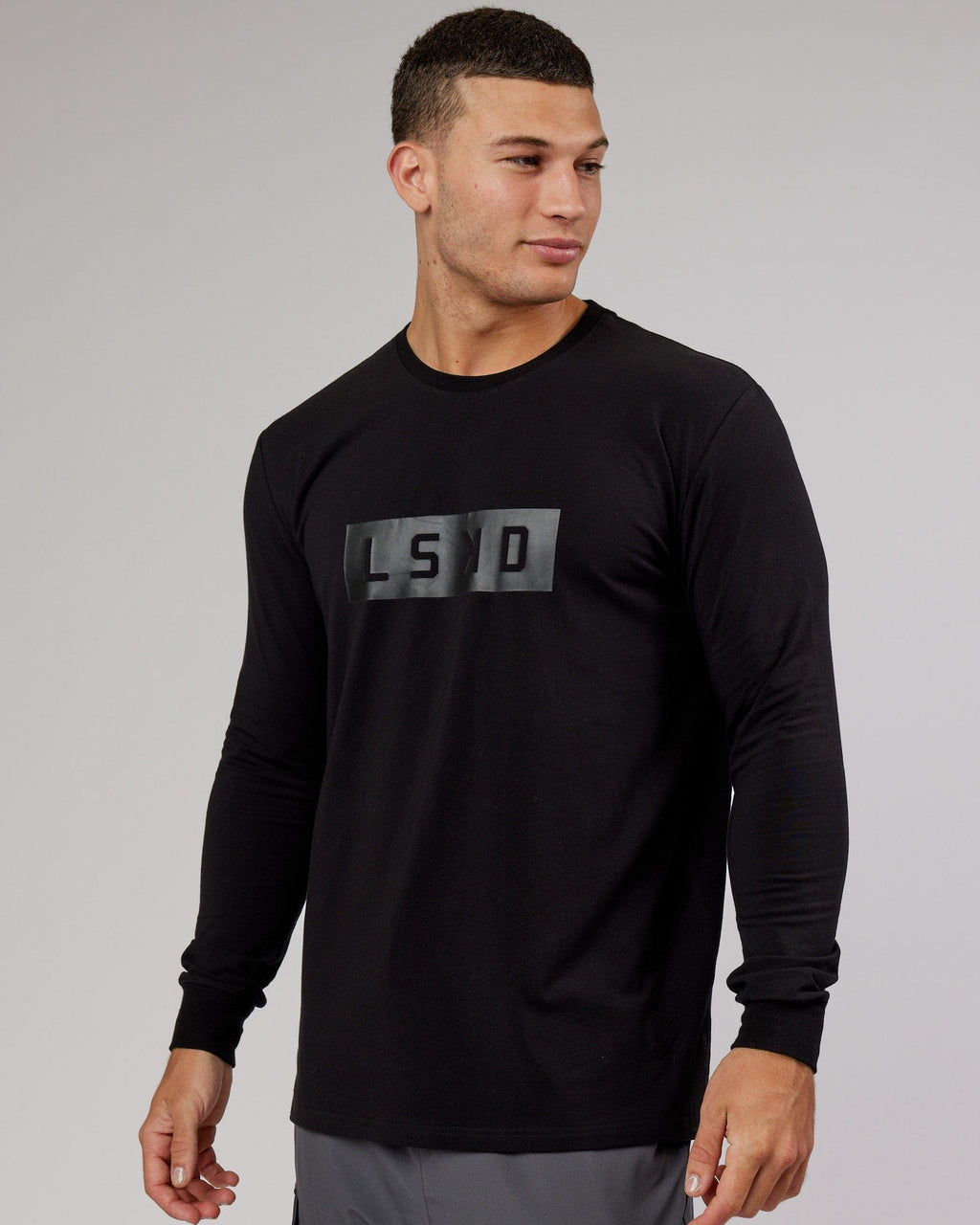 Model wearing Strength FLXDRY Performance LS Tee - Black