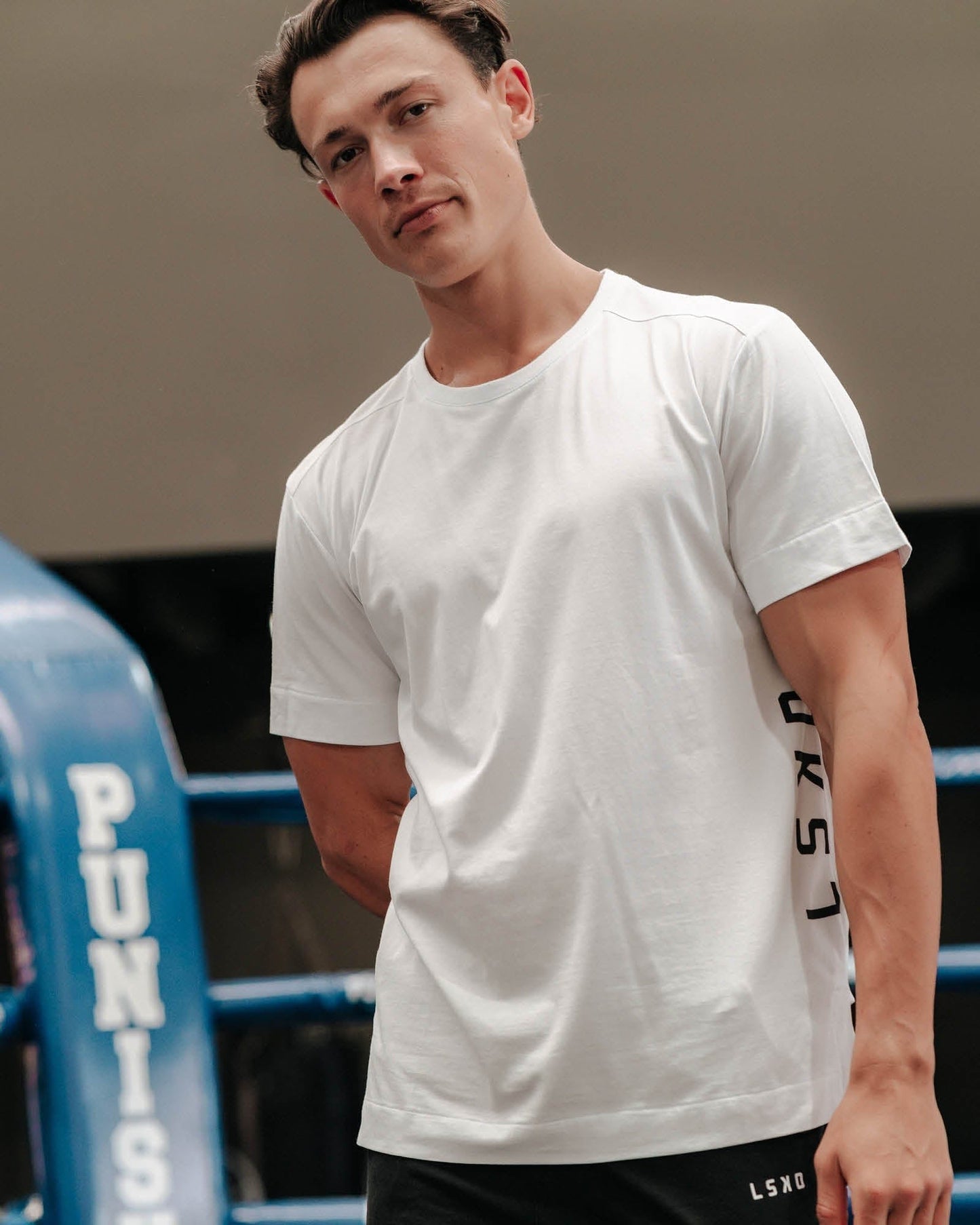 Model wearing Flex Tee - White