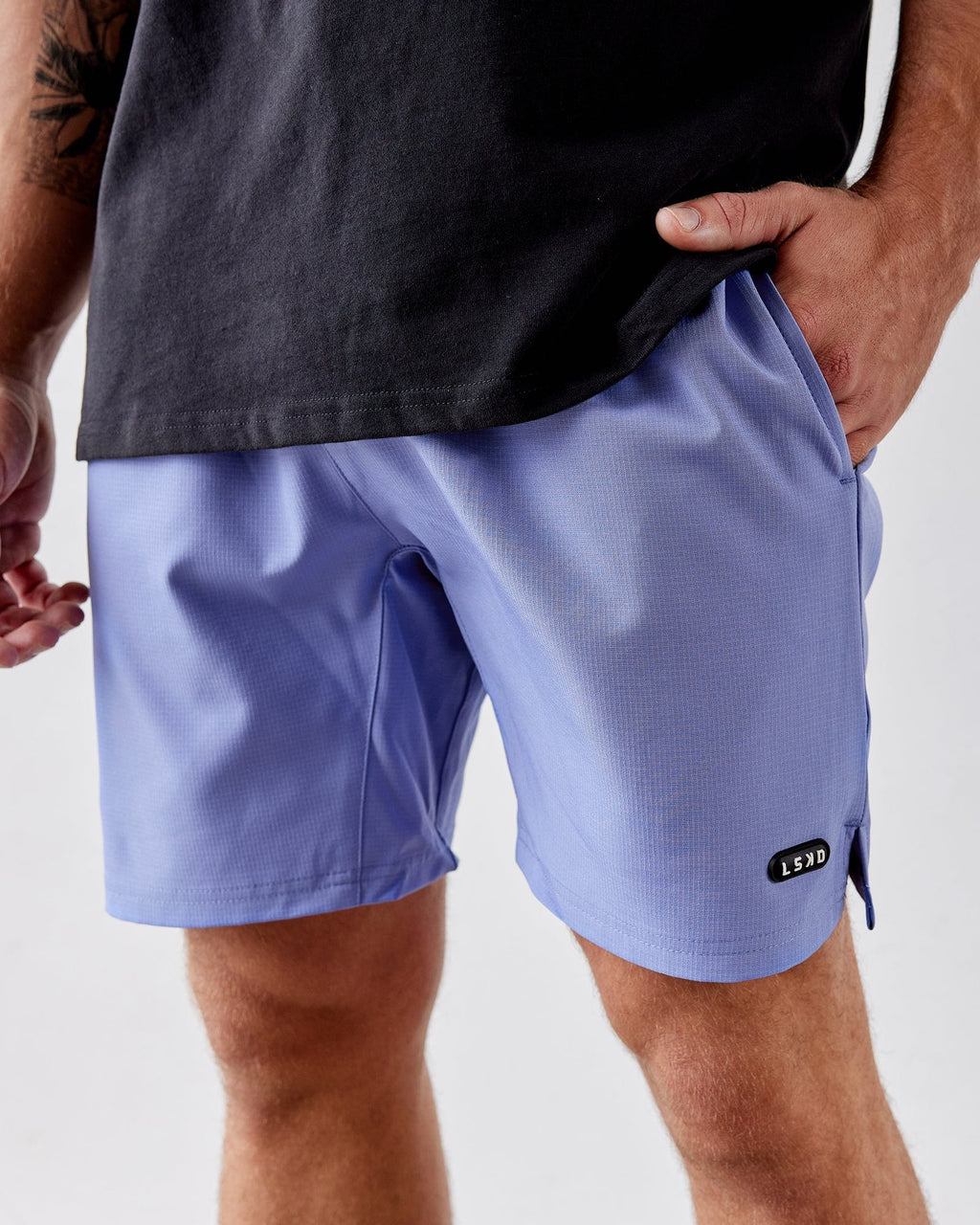Model wearing Capsule 7" Performance Short - Cornflower Blue