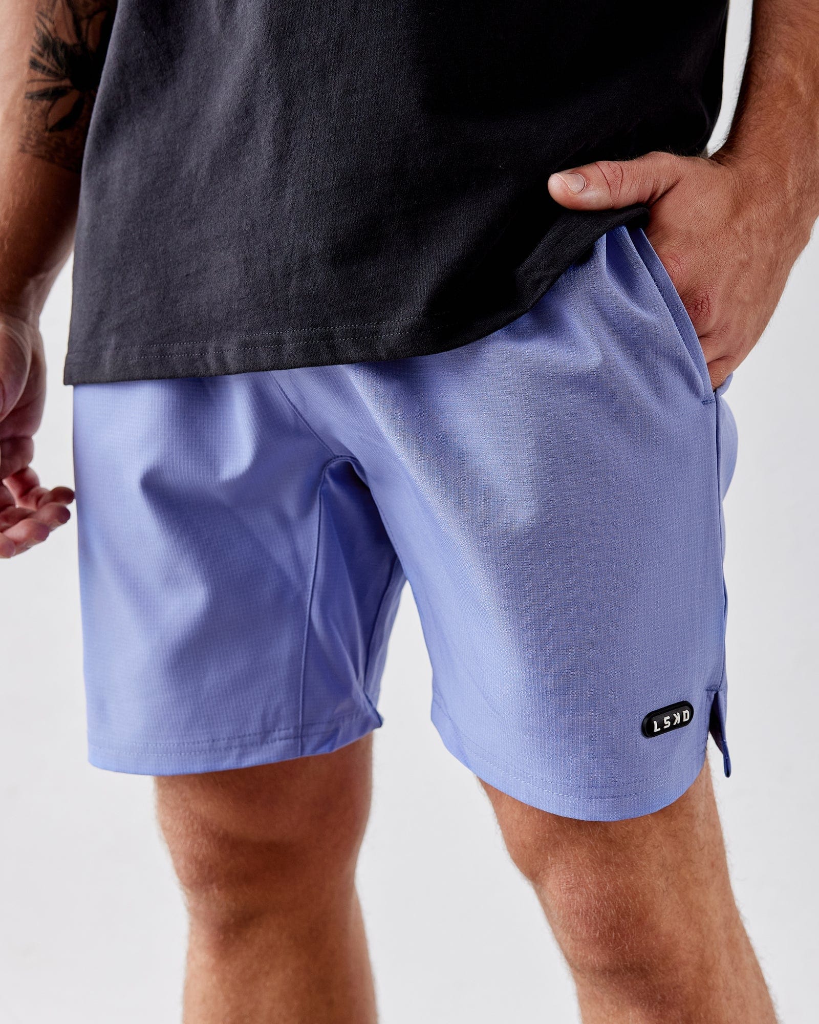 Model wearing Capsule 7" Performance Short - Cornflower Blue