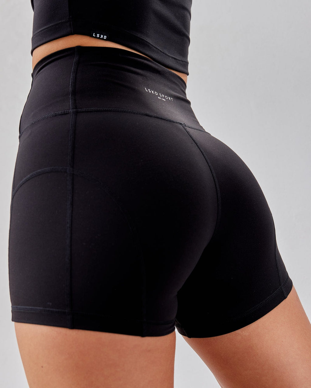 Model wearing Bend X-Short Tight - Black