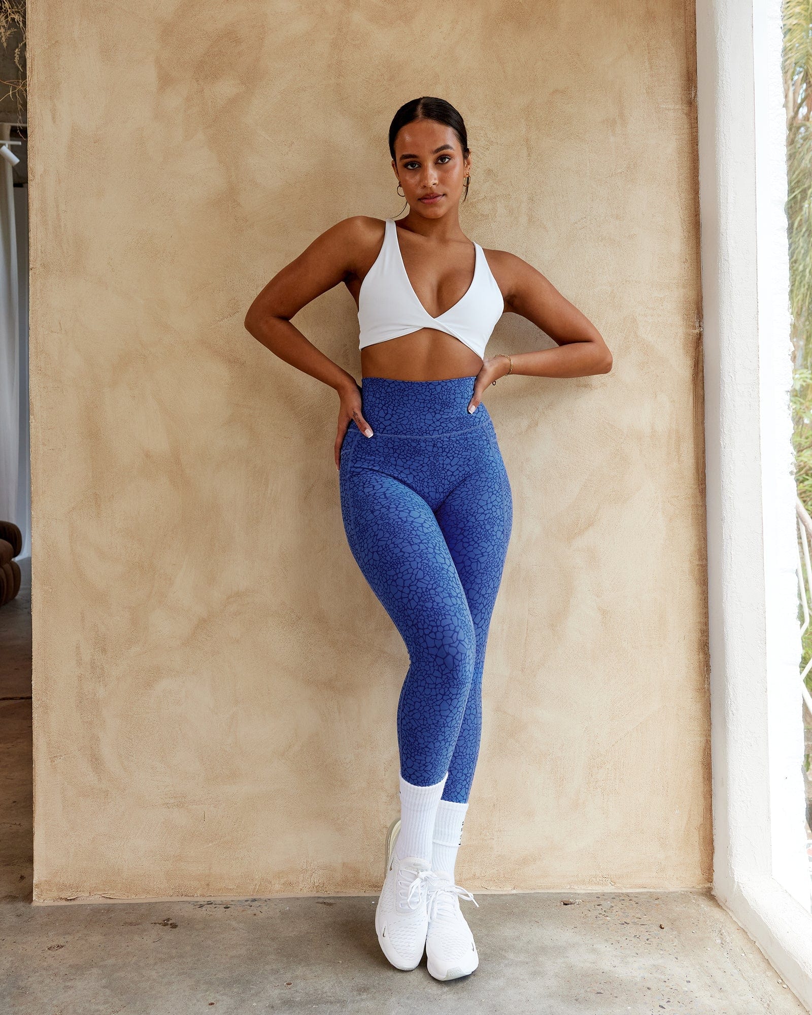 Model wearing Agile Sports Bra - White