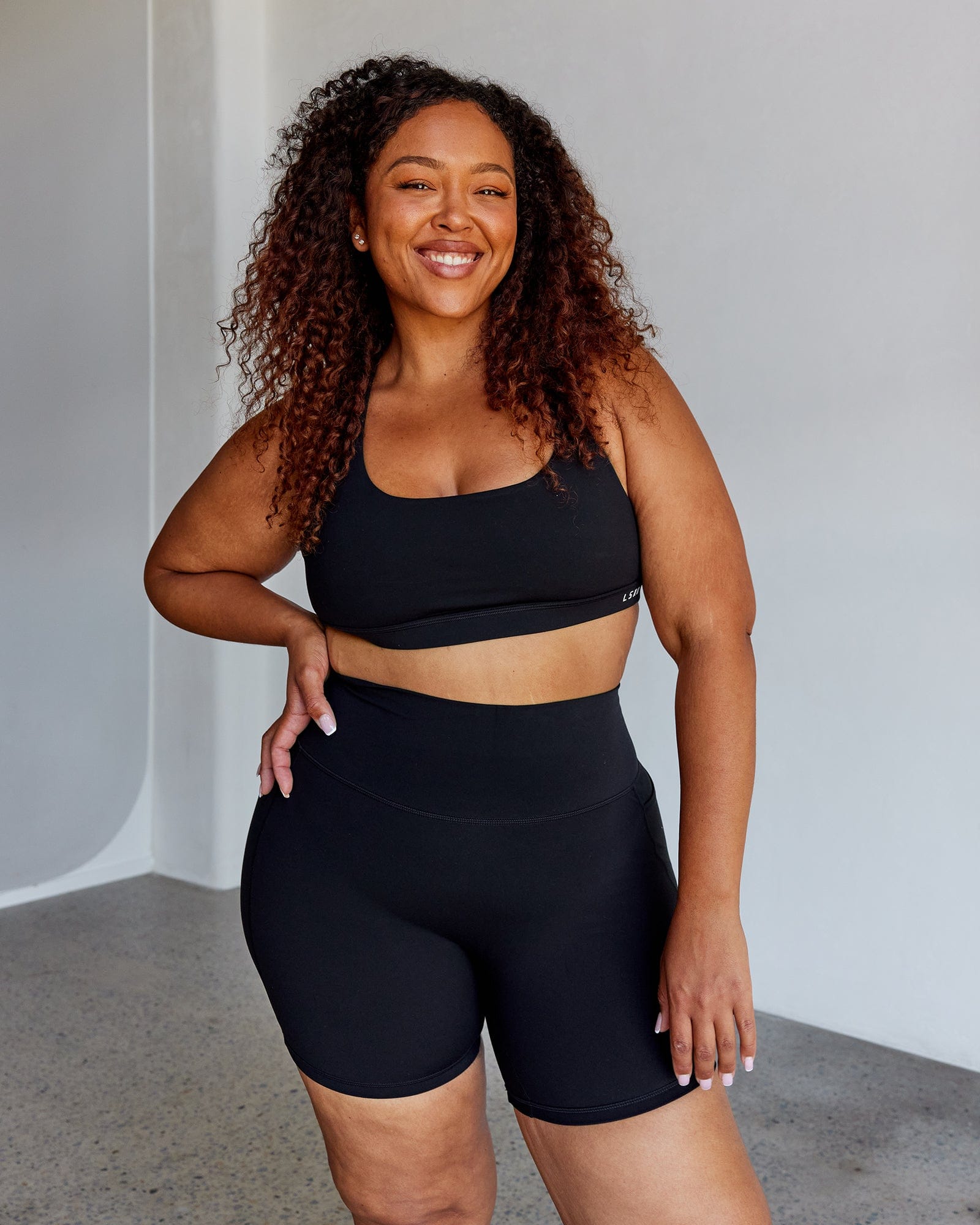 Model wearing Base Sports Bra - Black