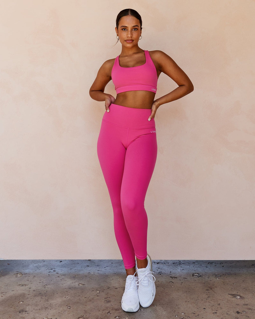 Model wearing Base Full Length Tight - Magenta