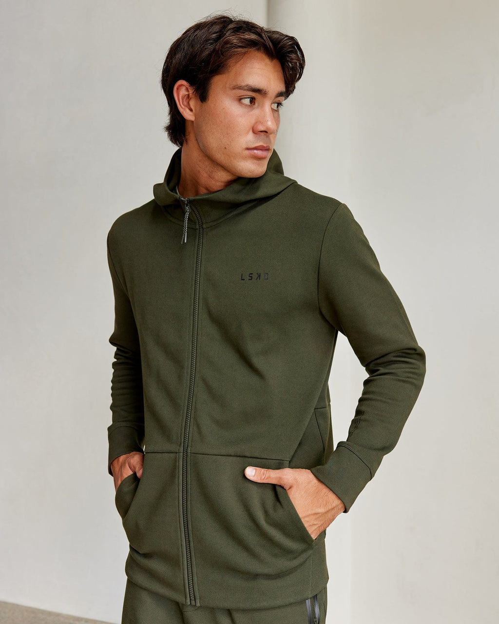 Model wearing Athlete ForgedFleece Zip Up Hoodie - Forest Night
