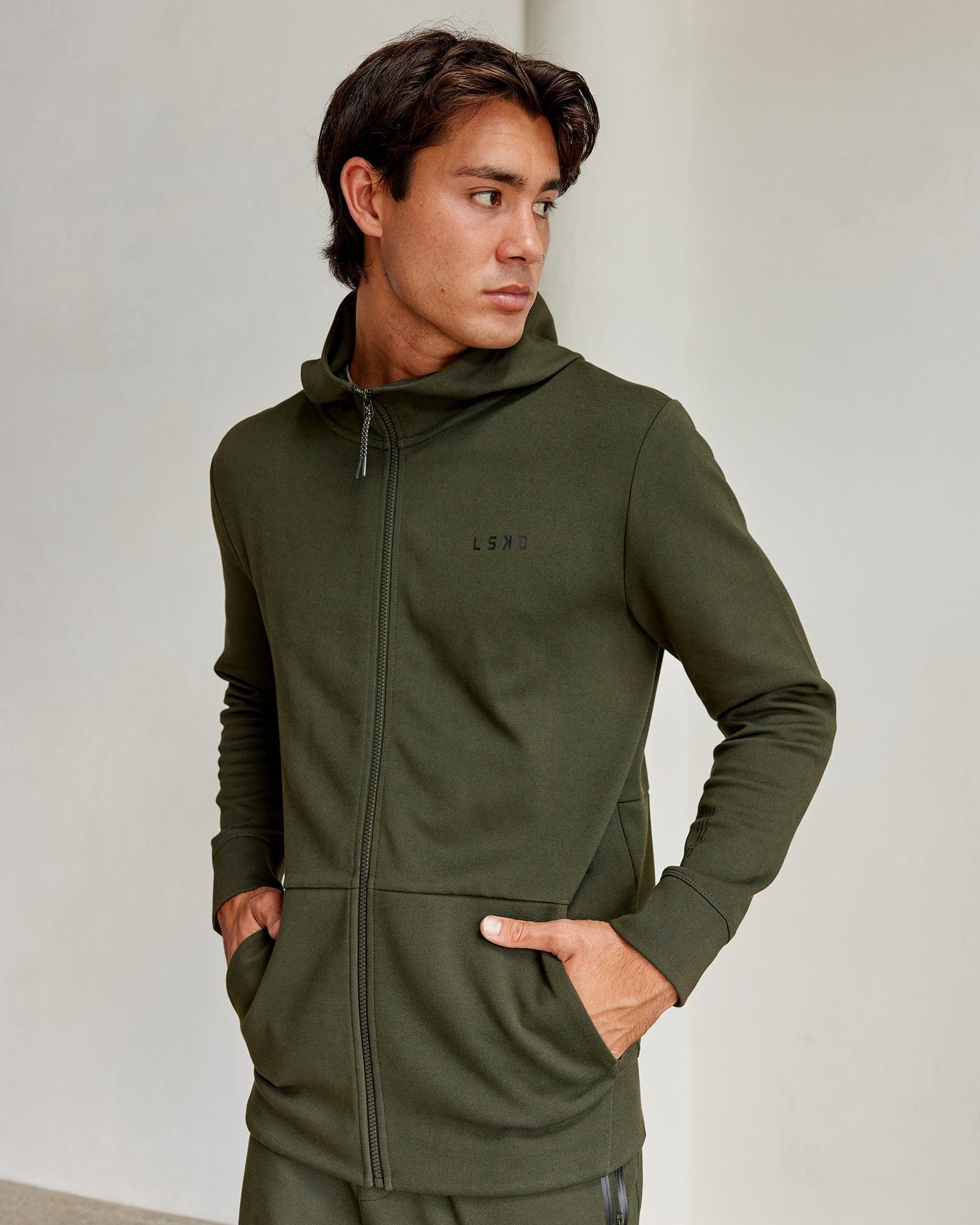 Model wearing Athlete ForgedFleece Zip Up Hoodie - Forest Night