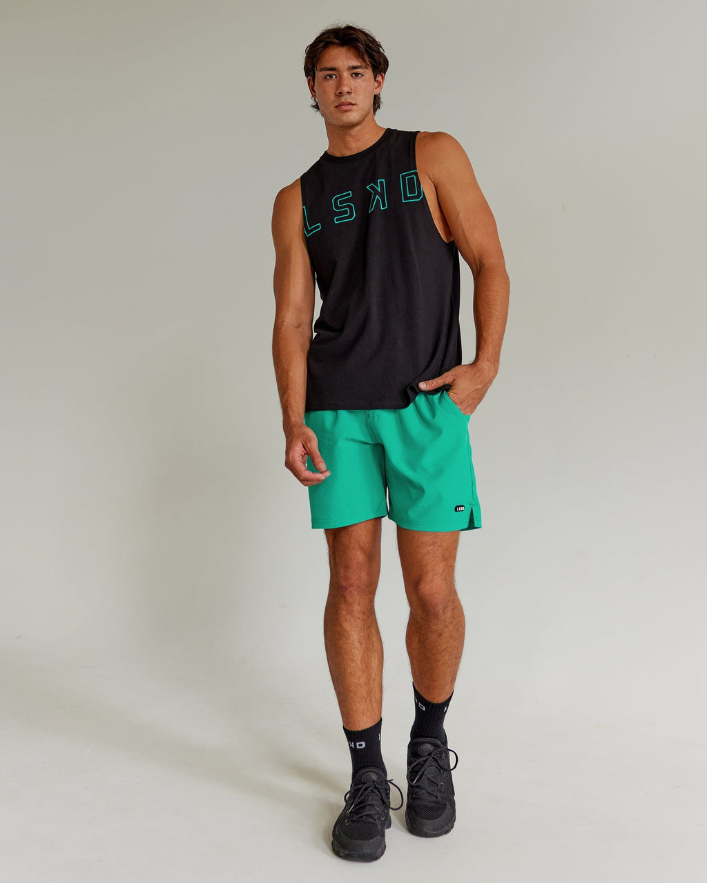 Model wearing Expand FLXCotton Training Fit Tank - Black-Hyper Teal