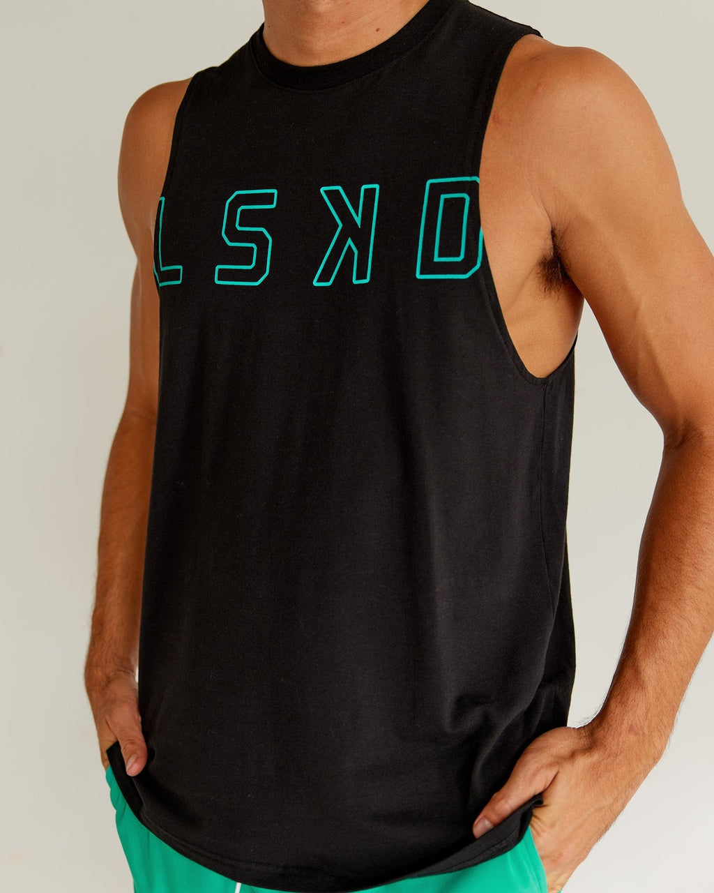 Model wearing Expand FLXCotton Training Fit Tank - Black-Hyper Teal