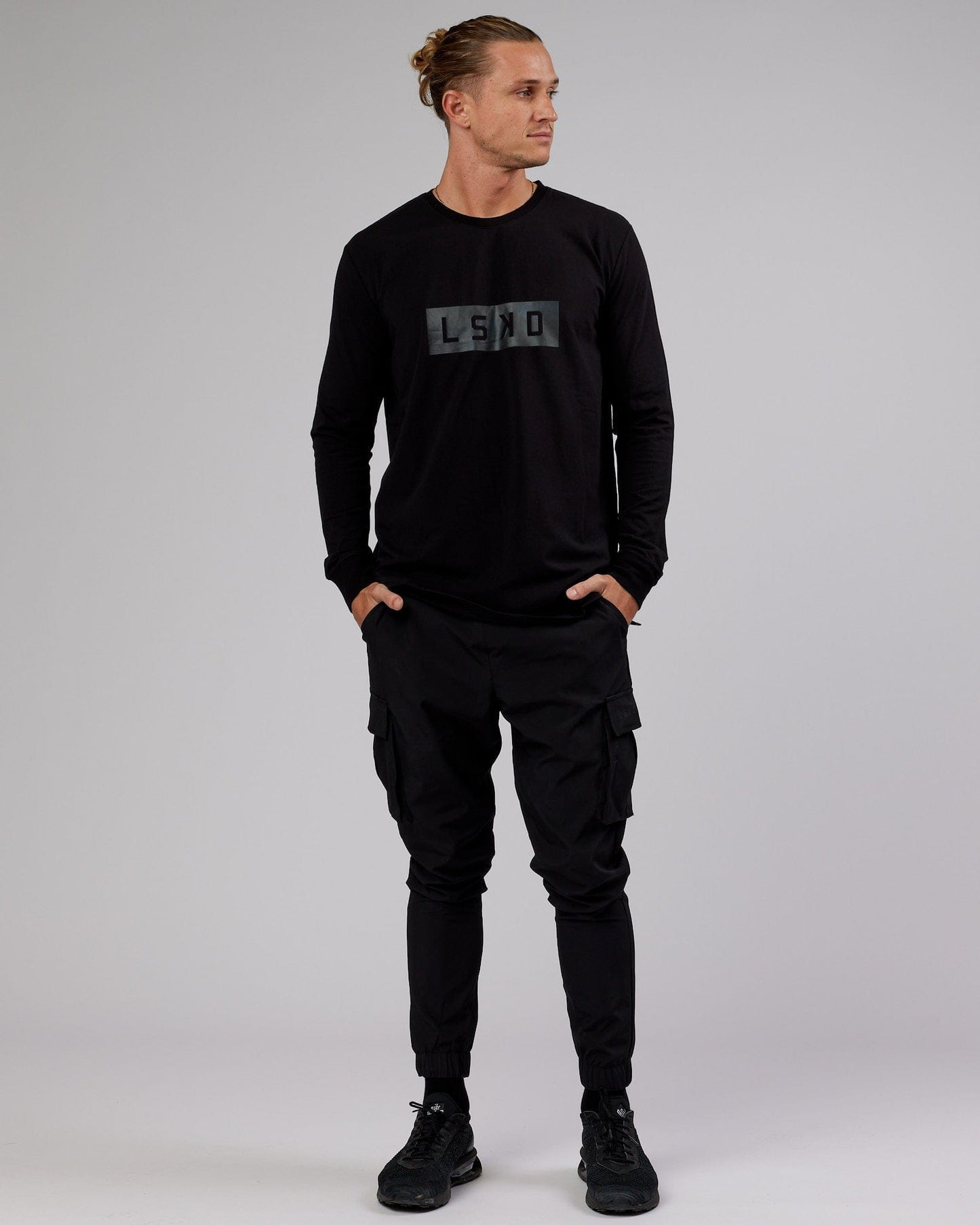 Model wearing Strength FLXCotton LS Tee - Black-Black