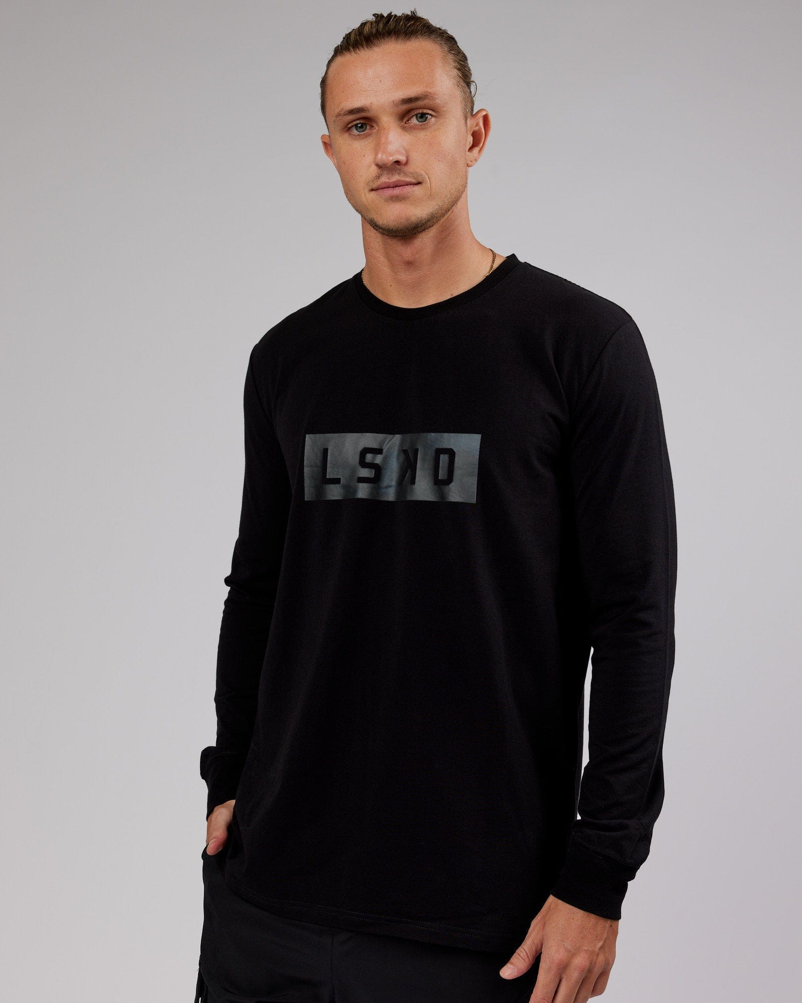 Model wearing Strength FLXCotton LS Tee - Black-Black