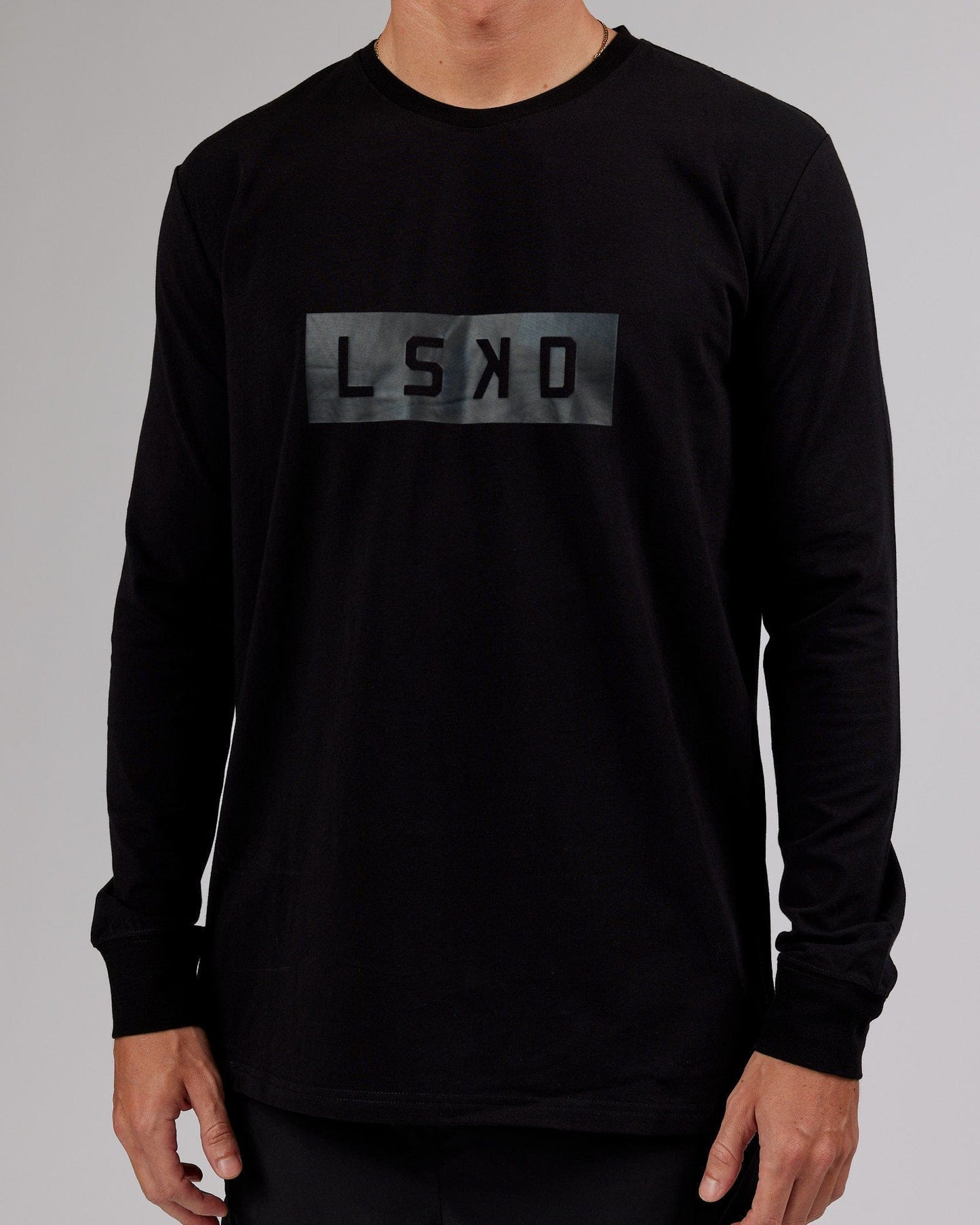 Model wearing Strength FLXCotton LS Tee - Black-Black