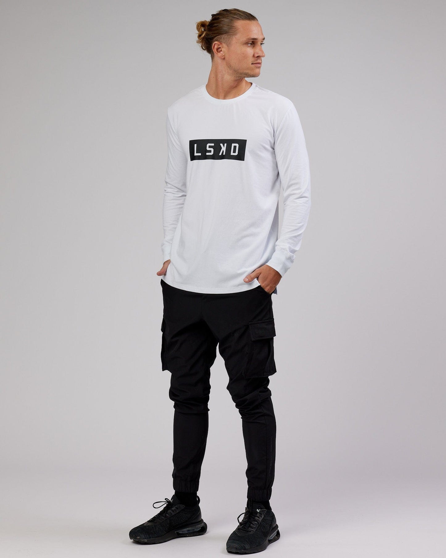 Model wearing Strength FLXCotton LS Tee - White-Black