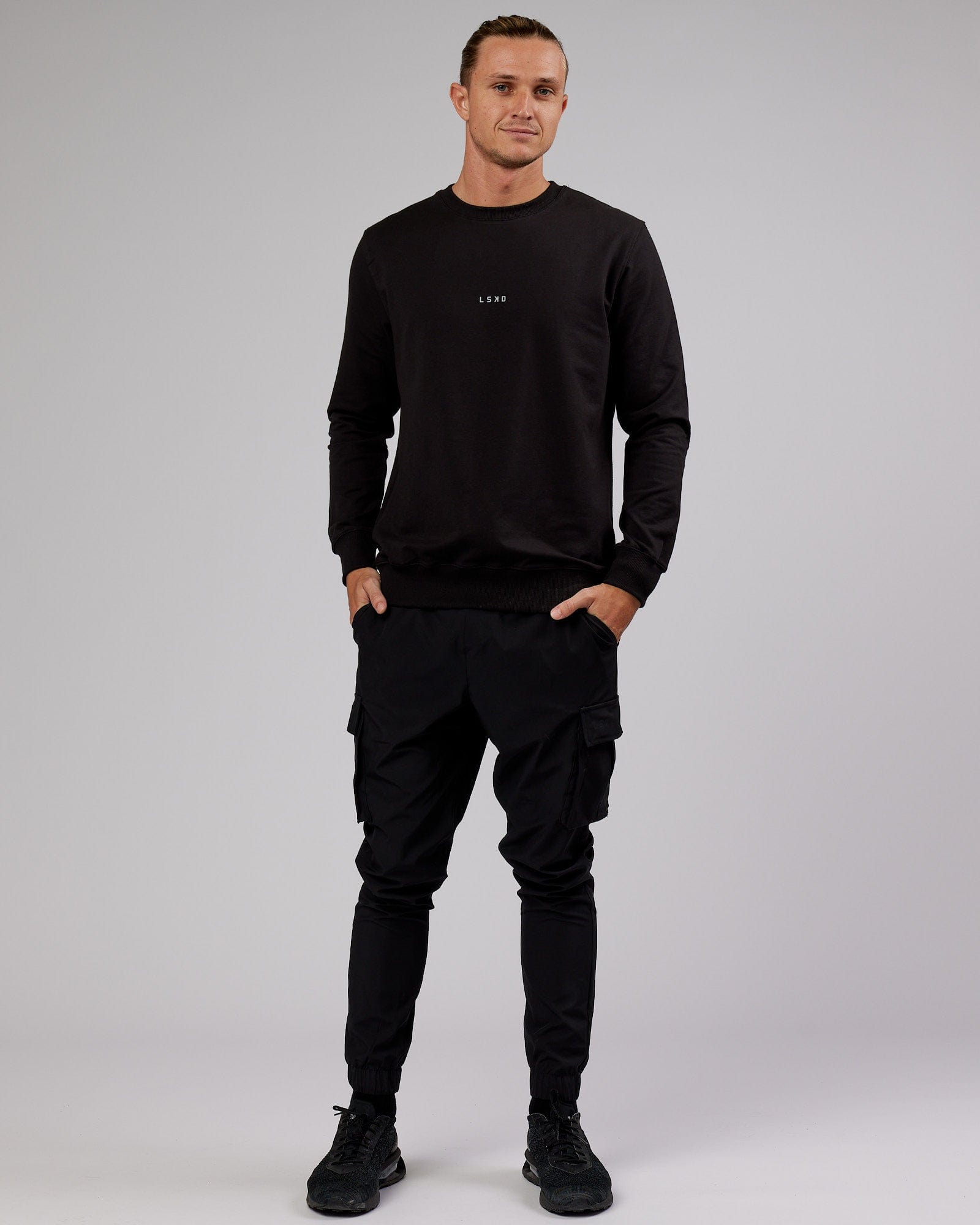Model wearing Base Sweater - Black