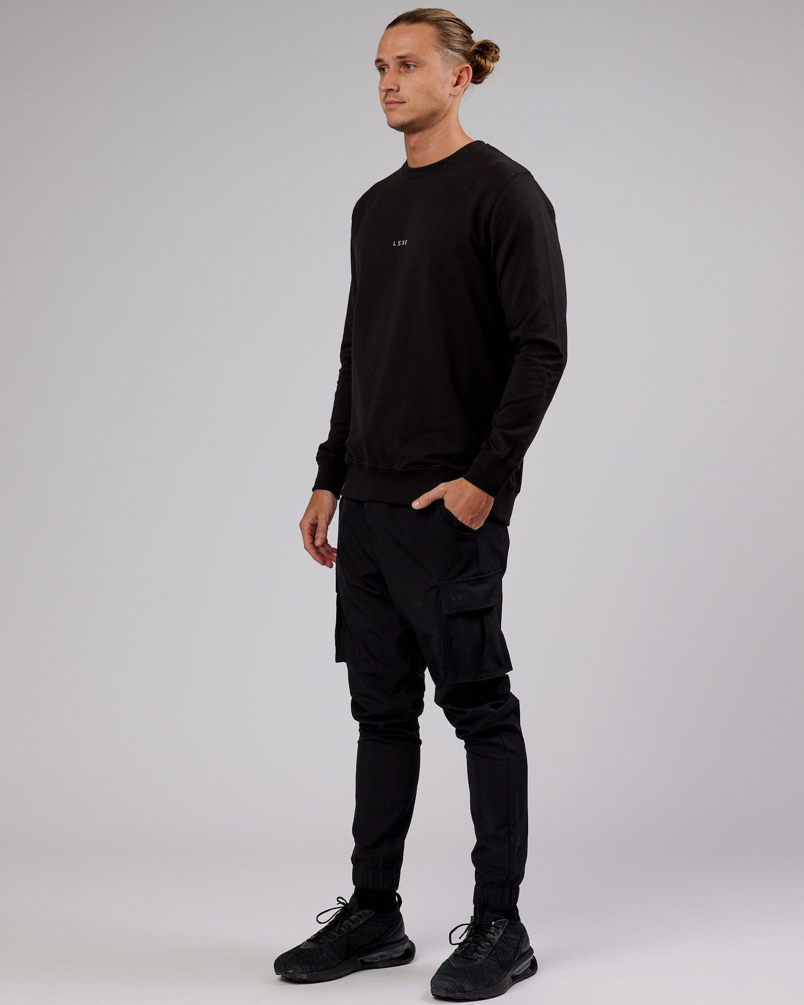 Model wearing Base Sweater - Black