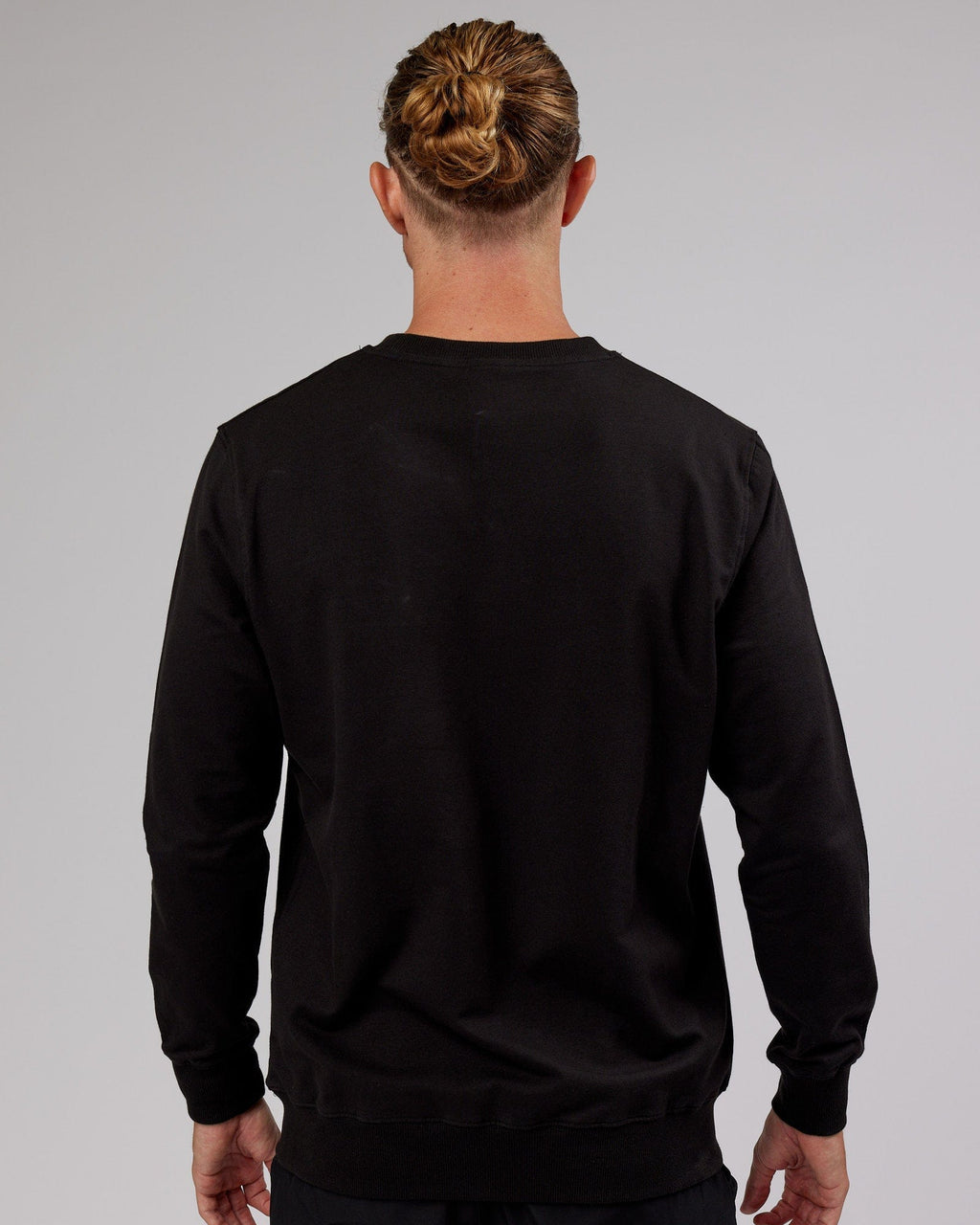 Model wearing Base Sweater - Black